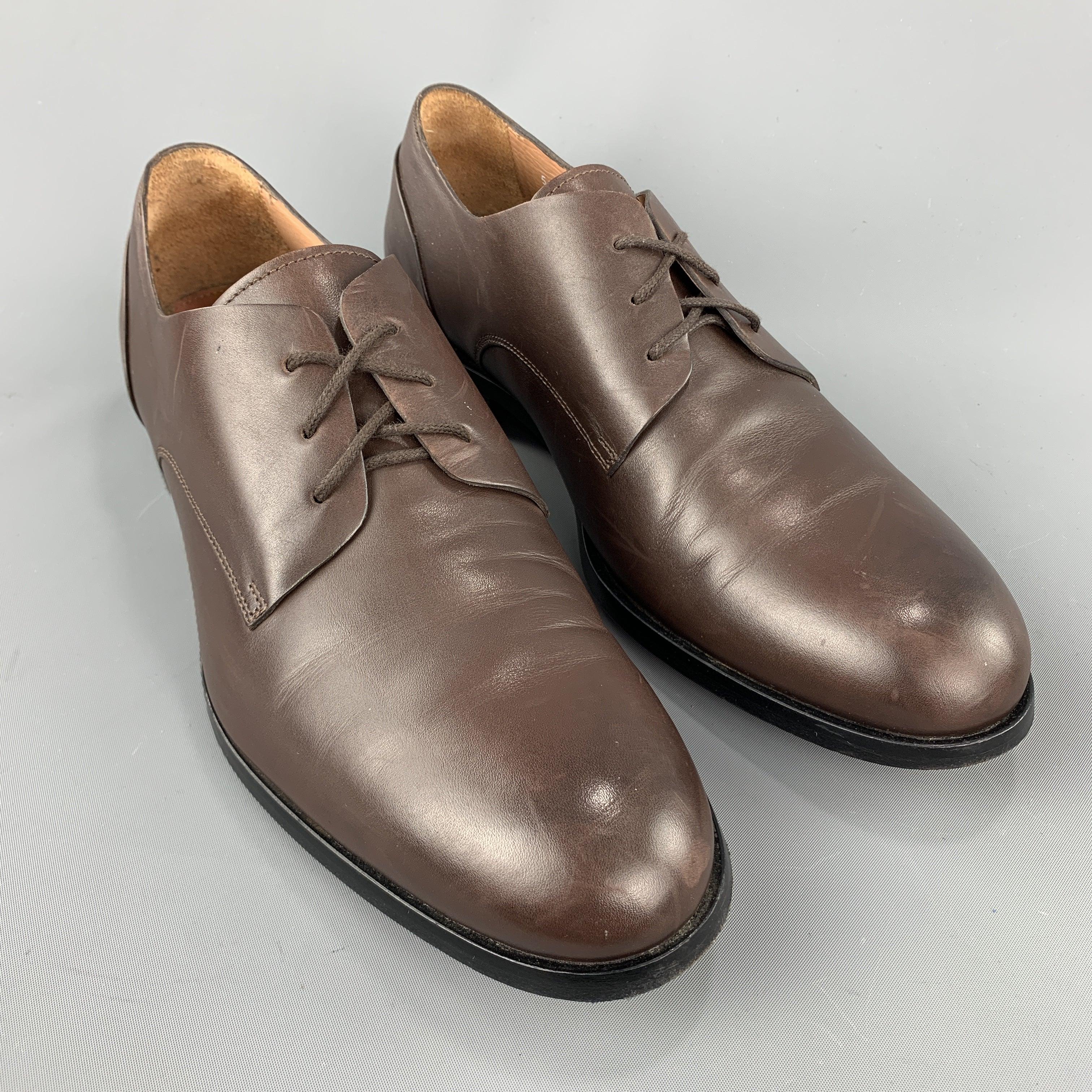 PAUL SMITH shoes comes in a brown leather featuring a lace up style and a wooden heel. Made in Italy.
Excellent
Pre-Owned Condition. 

Marked:   8Outsole: 
4 inches  x 12 inches 
  
  
 
Reference: 97615
Category: Lace Up Shoes
More Details
   