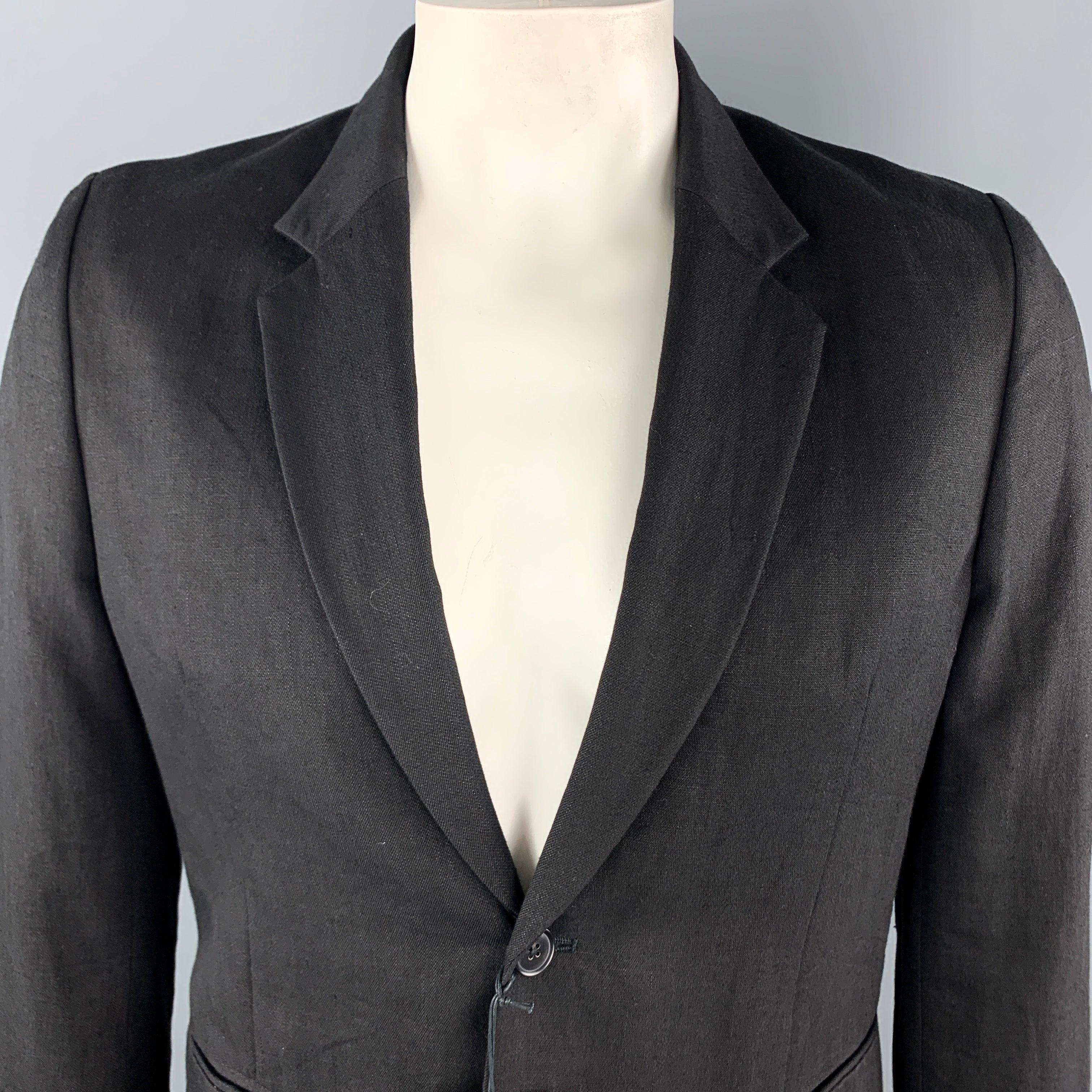 PAUL SMITH Sport Coat comes in a solid black linen / wool material, with a notch lapel, slit pockets, a single button at closure, single breasted, unbuttoned cuffs, unlined. Made in Italy.New with Tags. 

Marked:   No size 

Measurements: 
