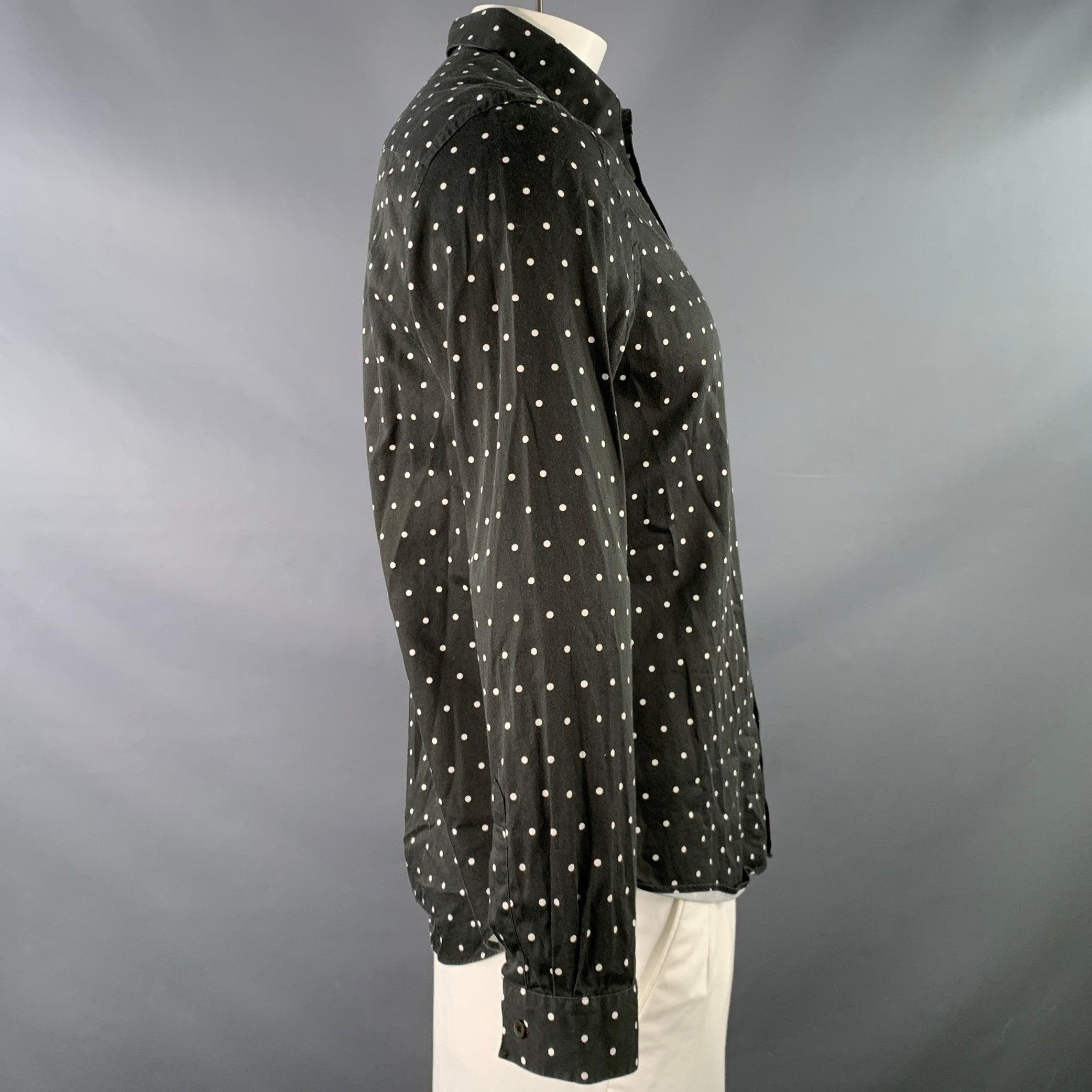 PAUL SMITH long sleeve shirt
in a black and white cotton woven fabric featuring a polka dot pattern, point collar, and button closure.
Made in Italy.Good Pre-Owned Condition. Moderate signs of wear, as is. 

Marked:   L 

Measurements: 
 
Shoulder: