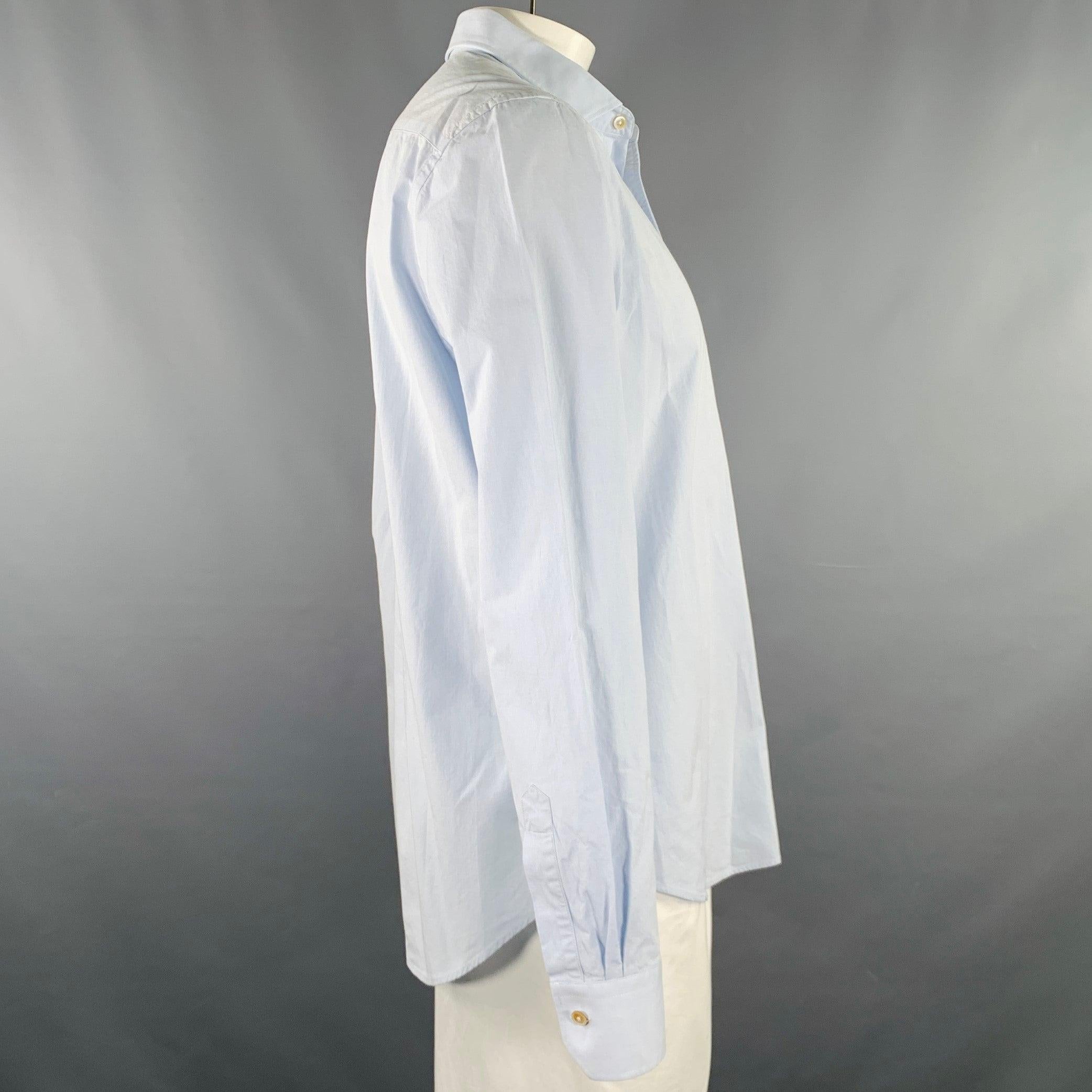 PAUL SMITH long sleeve shirt
in a blue cotton woven fabric featuring a spread collar, one pocket, and button closure.
Made in Italy. Note: this garment has been professionally altered. Please double check measurements.Excellent Pre-Owned Condition.