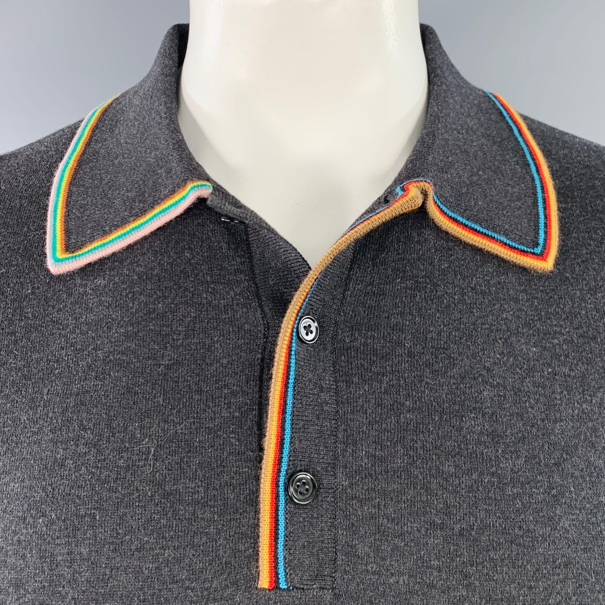PAUL SMITH polo
in a grey cotton merino wool blend fabric featuring multicolor contrast trim, long sleeves, and half placket button closure. Excellent Pre-Owned Condition. 

Marked:   L 

Measurements: 
 
Shoulder: 18 inches Chest: 45 inches Sleeve: