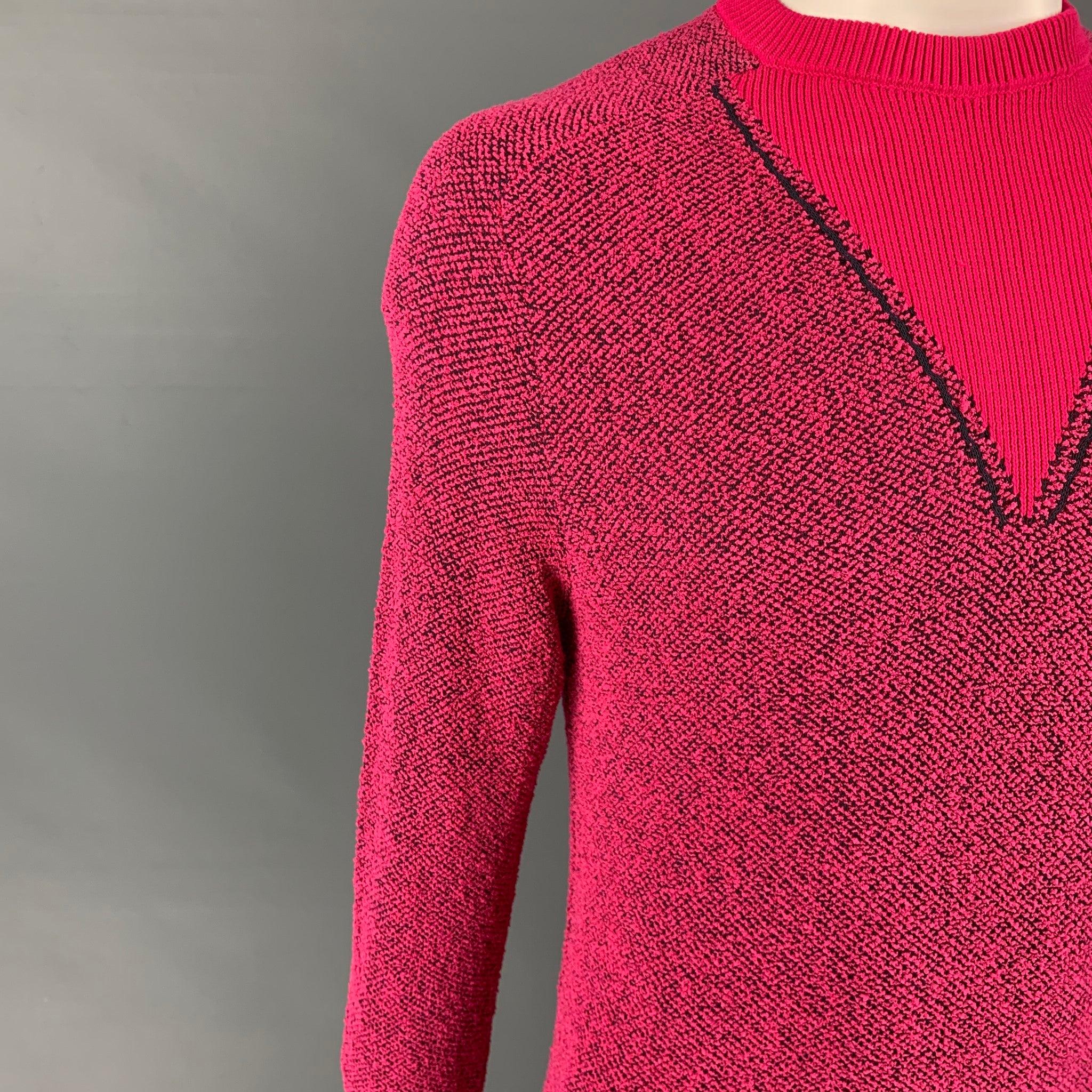 PAUL SMITH pullover comes in a pink & black textured polyamide blend featuring a crew-neck.
New with tags. 

Marked:   L  

Measurements: 
 
Shoulder: 17.5 inches Chest: 40 inches 
Sleeve: 30 inches Length: 25 inches 
  
  
 
Reference: