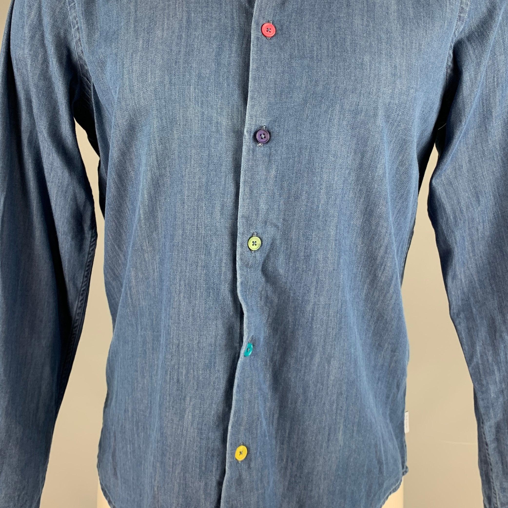 PS by PAUL SMITH long sleeve shirt
in a blue cotton fabric featuring a tailored fit, spread collar, and mismatched multi-color button closure. Made in Portugal.Excellent Pre-Owned Condition. 

Marked:   S 

Measurements: 
 
Shoulder: 15.5 inches