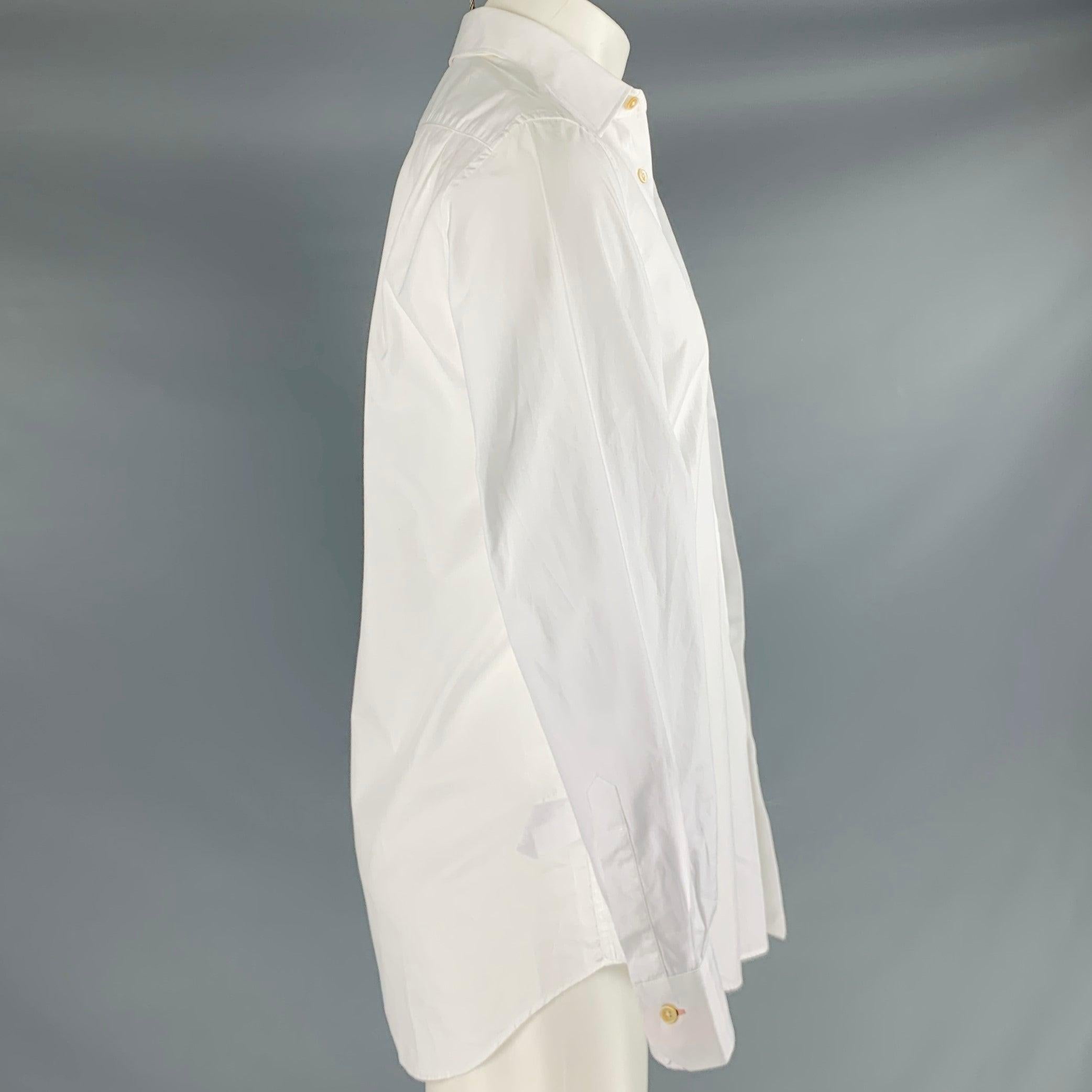 PAUL SMITH long sleeve shirt
in a white cotton blend fabric featuring a classic fit, spread collar, and button closure. Made in Italy.Excellent Pre-Owned Condition. 

Marked:   15
