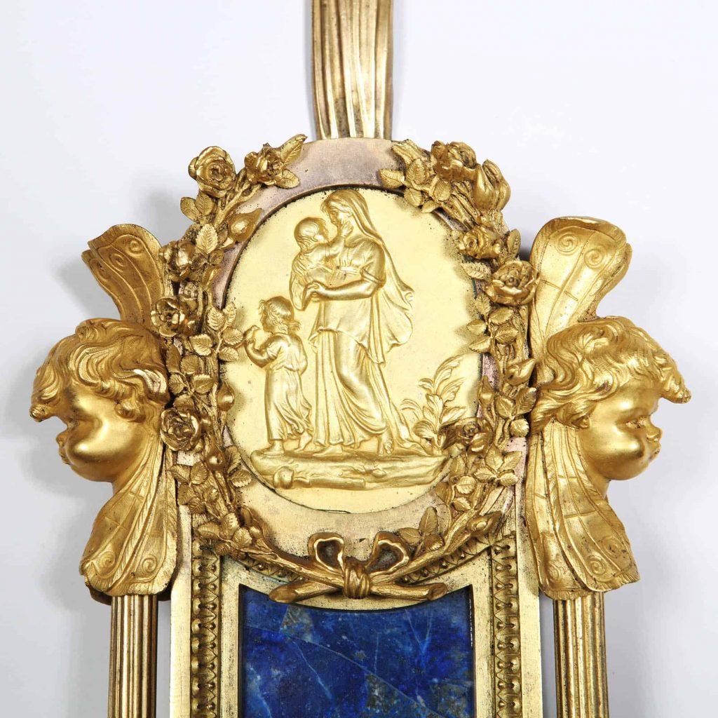 Paul Sormani(1817-1877), magnificent French 19th century gilt bronze ormolu and Lapis Lazuli wall clock. Richly decorated with panels of gilt bronze in high relief flanked by classical symbolism, floral garlands and winged putti around a central