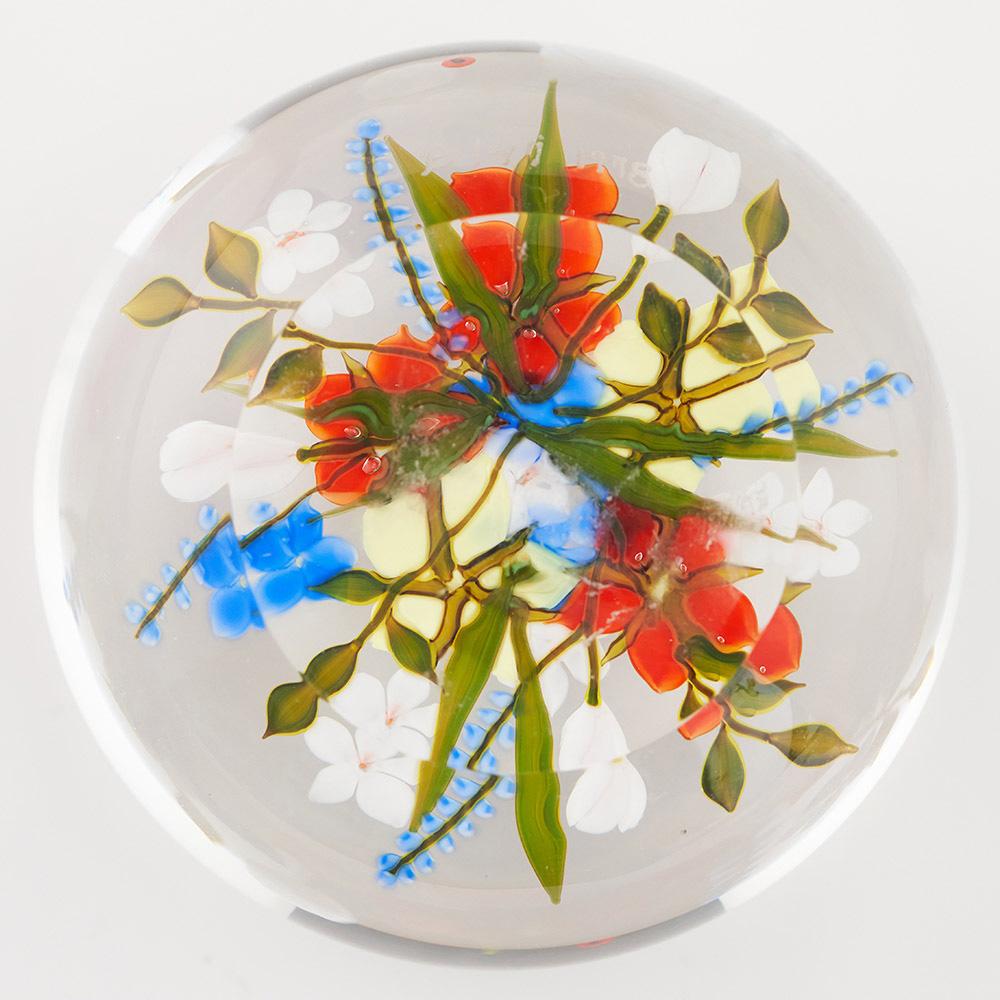 Heading : A fine bouquet lampwork paperweight by Paul Stankard
Date : 1978
Origin : USA
Features : Wild roses, forget-me-nots and other flowers with associated foliage
Type : Lead glass
Size : 7.55cm diameter
Condition : Excellent
Restoration :