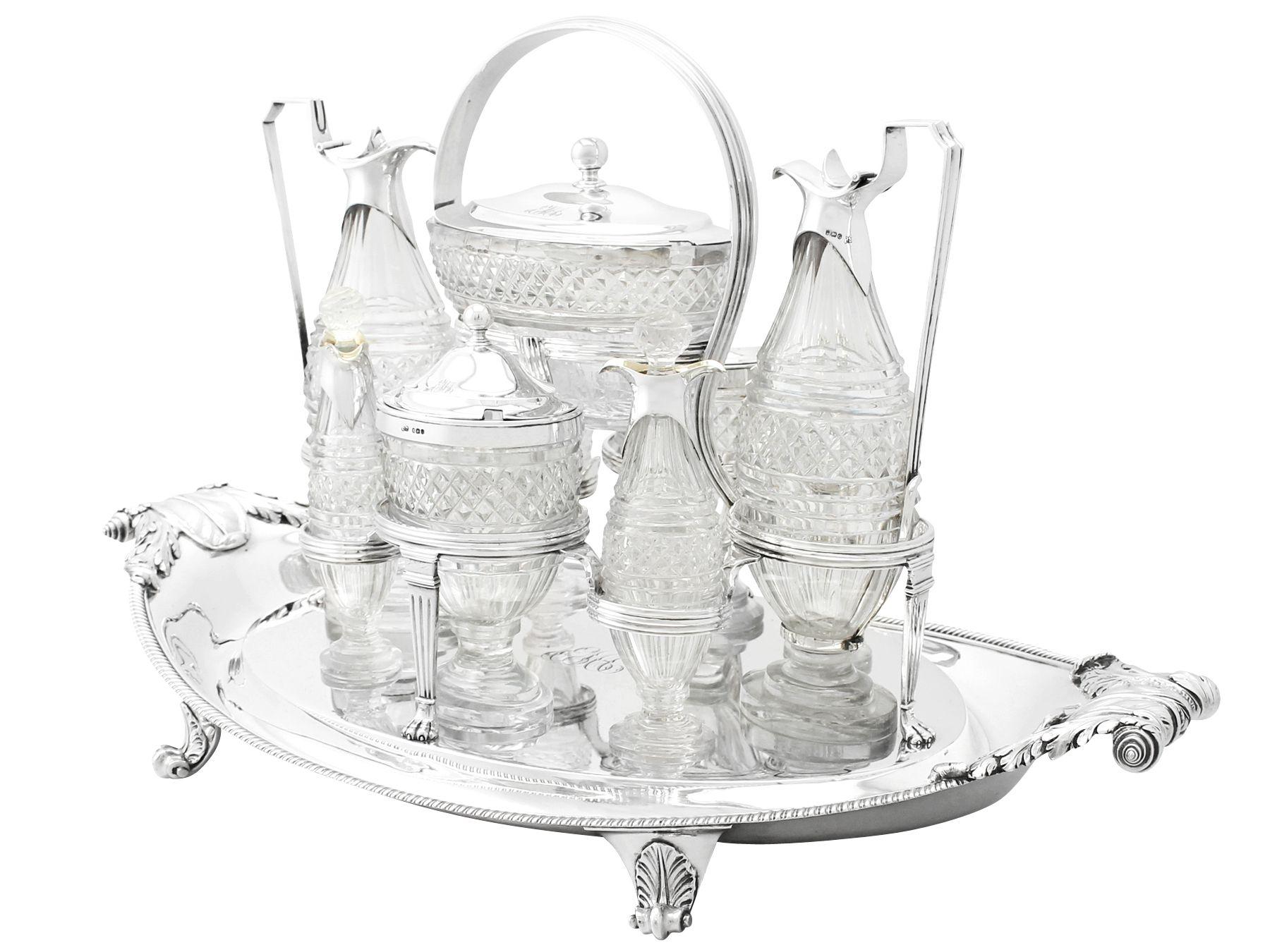 A magnificent, fine and impressive, antique Georgian English sterling silver and cut-glass nine bottle table cruet set made by Paul Storr; an addition to our collectable dining silverware.

This magnificent and large antique George III cruet set