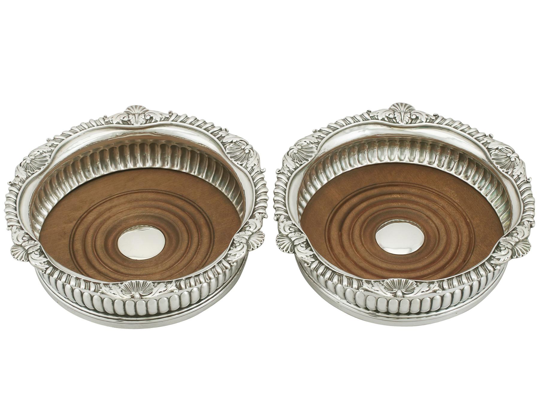 An exceptional, fine and impressive pair of antique George III English sterling silver coasters made by Paul Storr; an addition to our range of collectable silverware

These exceptional antique George III sterling silver coasters have a circular