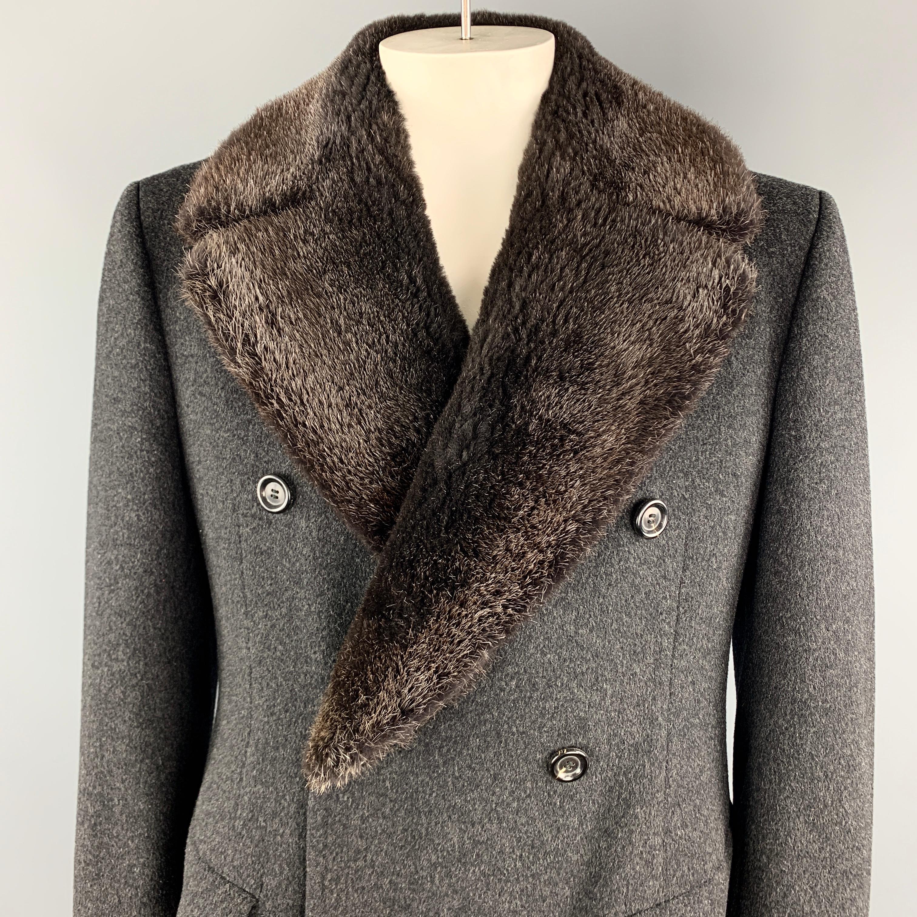 PAUL STUART Long Coat comes in a solid charcoal wool material, with a camel hair lapel, double breasted, with flap pockets, unbuttoned cuffs, and a single vent at back. Made in Denmark. 

Excellent Pre-Owned Condition.
Marked: No