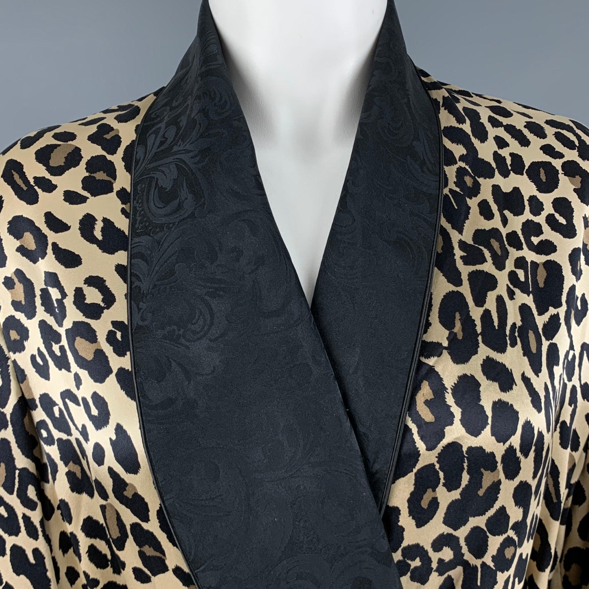 PAUL STUART bathrobe
in a black and beige silk fabric featuring animal print, black paisley contrast trim, and a belted style. Made in USA.Very Good Pre-Owned Condition. Minor mark. 

Marked:   M 

Measurements: 
 
Shoulder: 16.5 inches Bust: 40