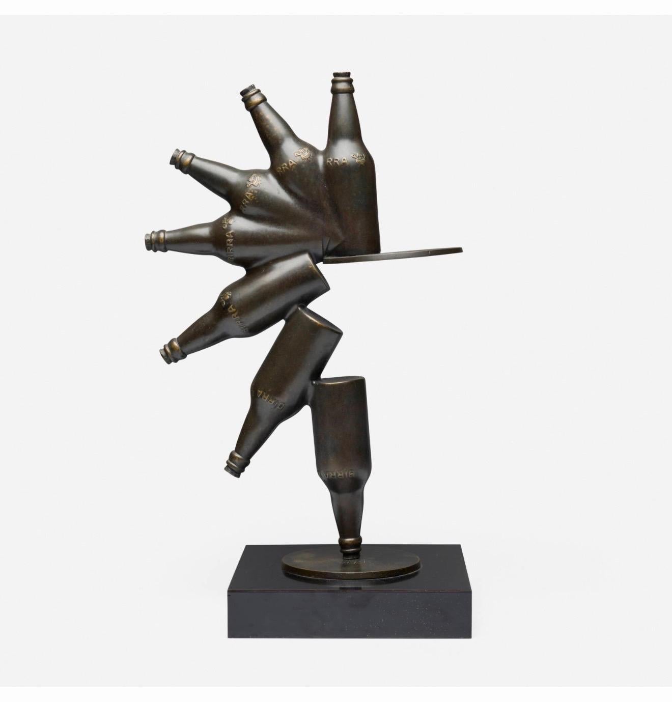 Paul Suttman (American, 1933 - 1993)
Bottles for Duchamp
Bronze
Dimensions: 23.25 h x 13.5 w x 10 d in (59 x 34 x 24 cm)
Impressed signature (initials and numbered to base 'PS V. II 1/1'. 
Hand signed and titled on bottom
This work is unique.
The