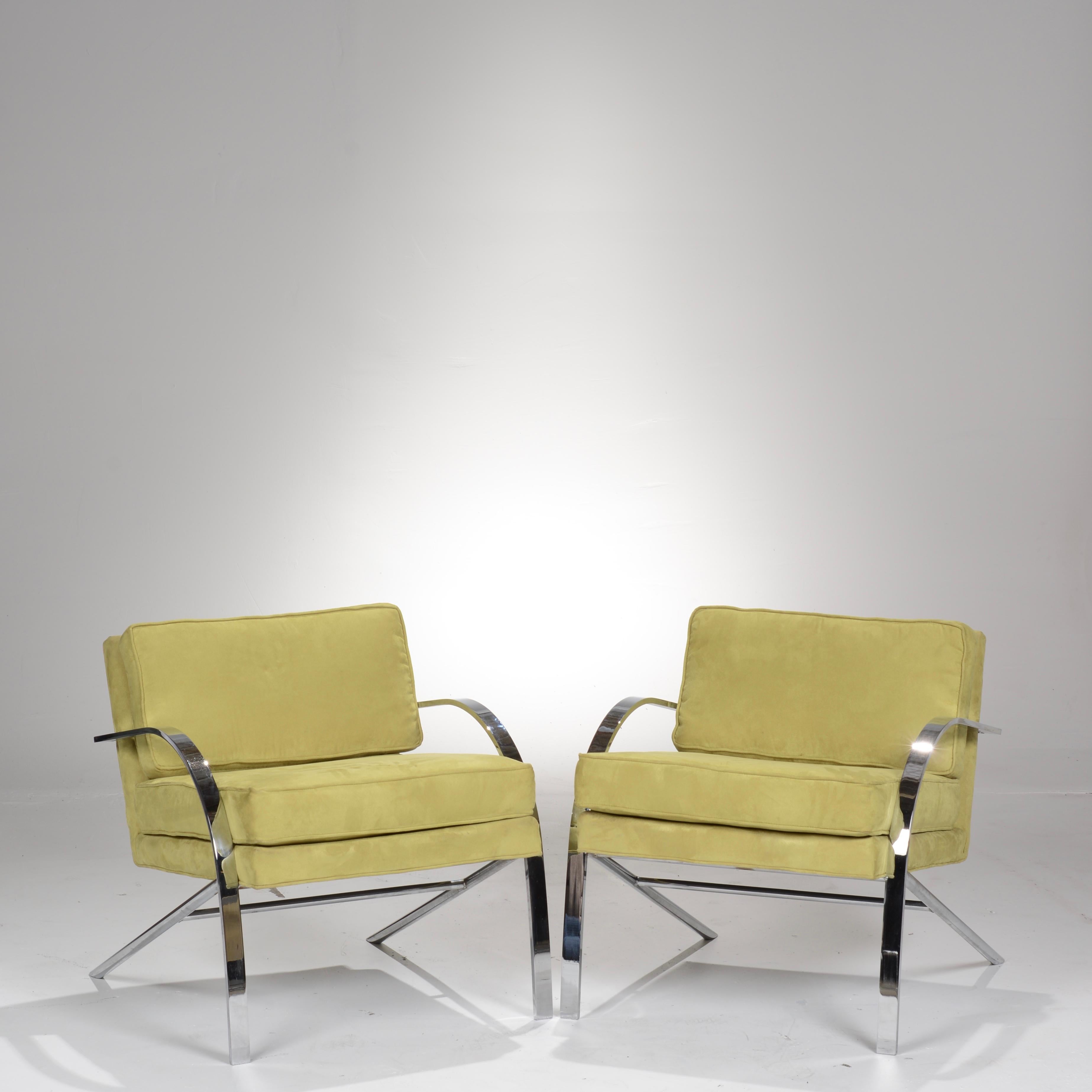Stunning pair stainless steel lounge chairs by Paul Tuttle. Upholstered in green suede leather.

 All items are viewable at our Downtown Los Angeles warehouse. 
