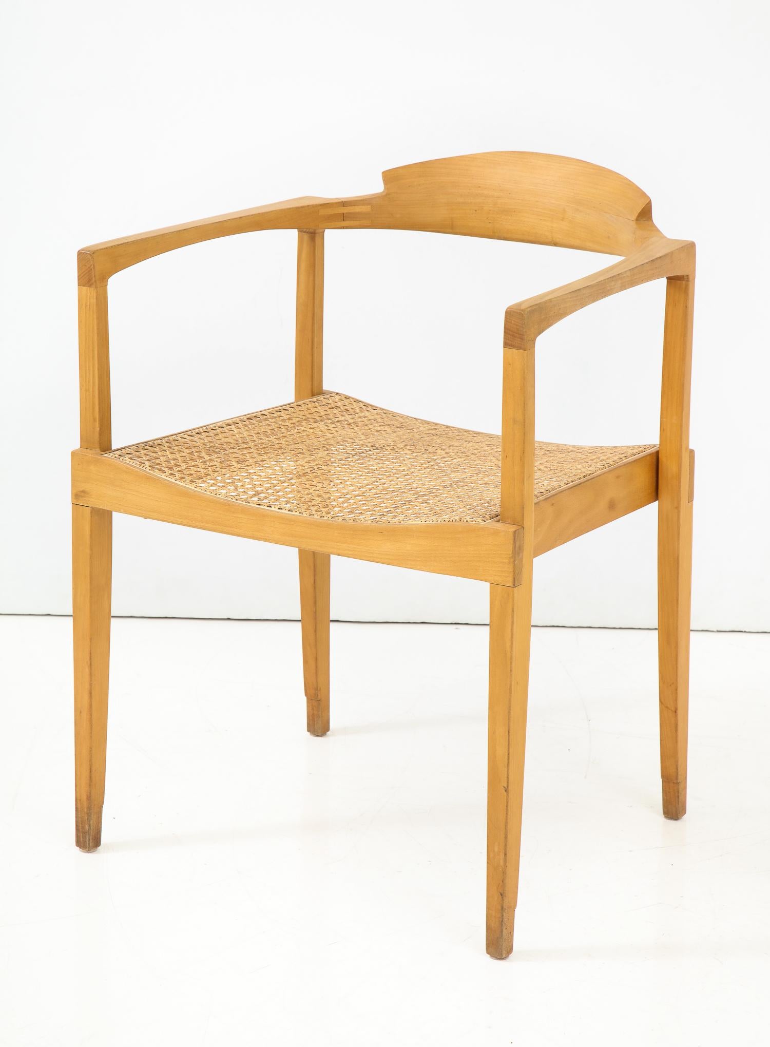 Elegant, rakish and well-crafted armchair by California designer Paul Tuttle. Fabricated in small numbers by Stanley Reifel of Carpenteria, CA, circa 1966. This example was part of a set made for Mrs. Esther Bear and was illustrated in solo