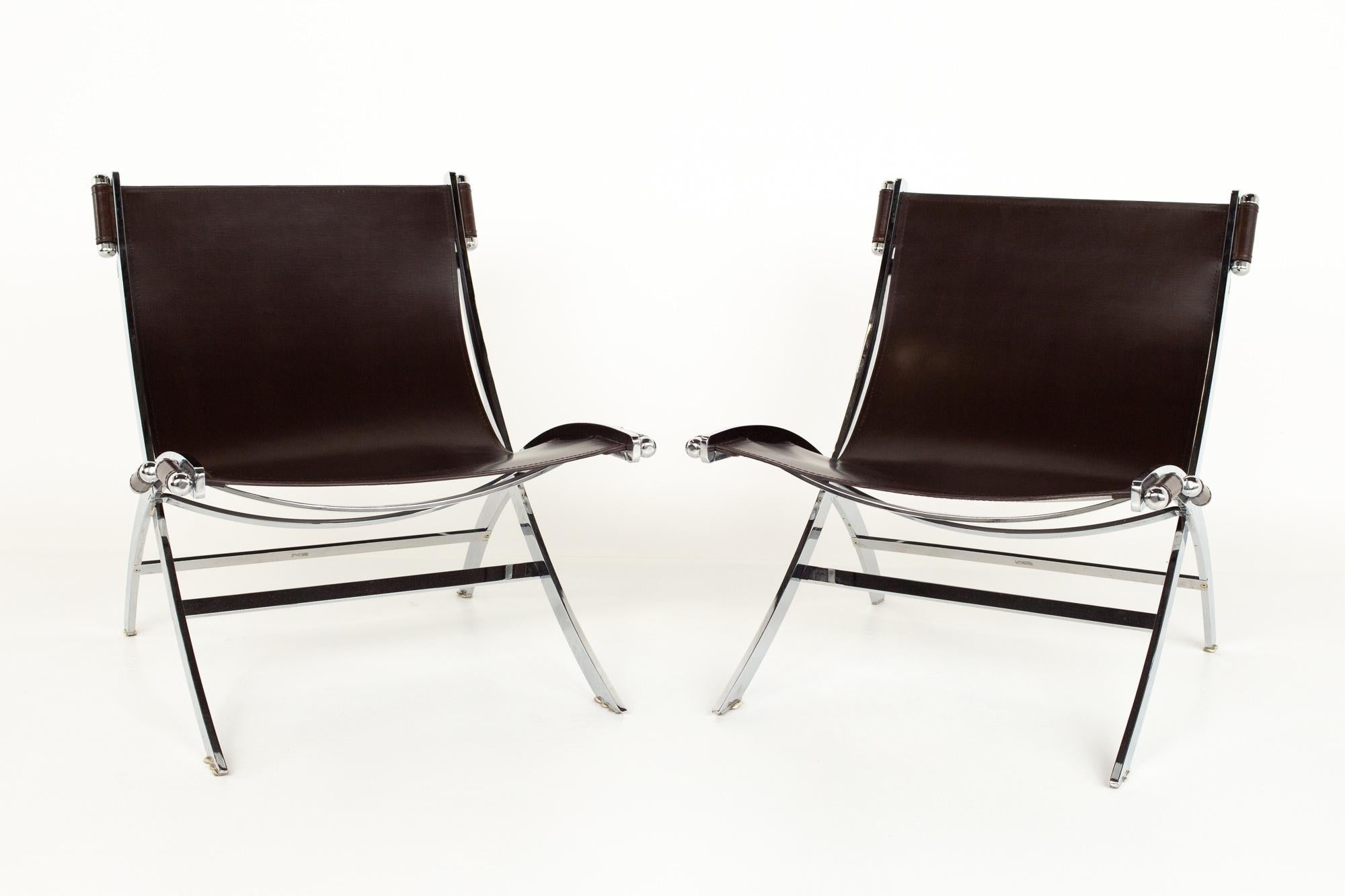 Paul Tuttle for Flexformstyle mid century brown leather and chrome lounge chairs - a pair

Each chair measures: 26 wide x 28 deep x 28.5 high, with a seat height of 14 inches

?All pieces of furniture can be had in what we call restored vintage