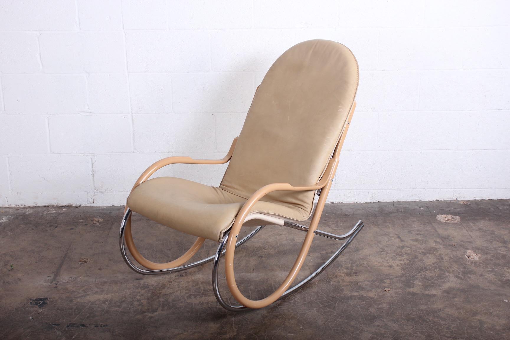 A leather, canvas, chrome-plated steel and lacquered wood 'Nonna' rocking chair design by Paul Tuttle.
