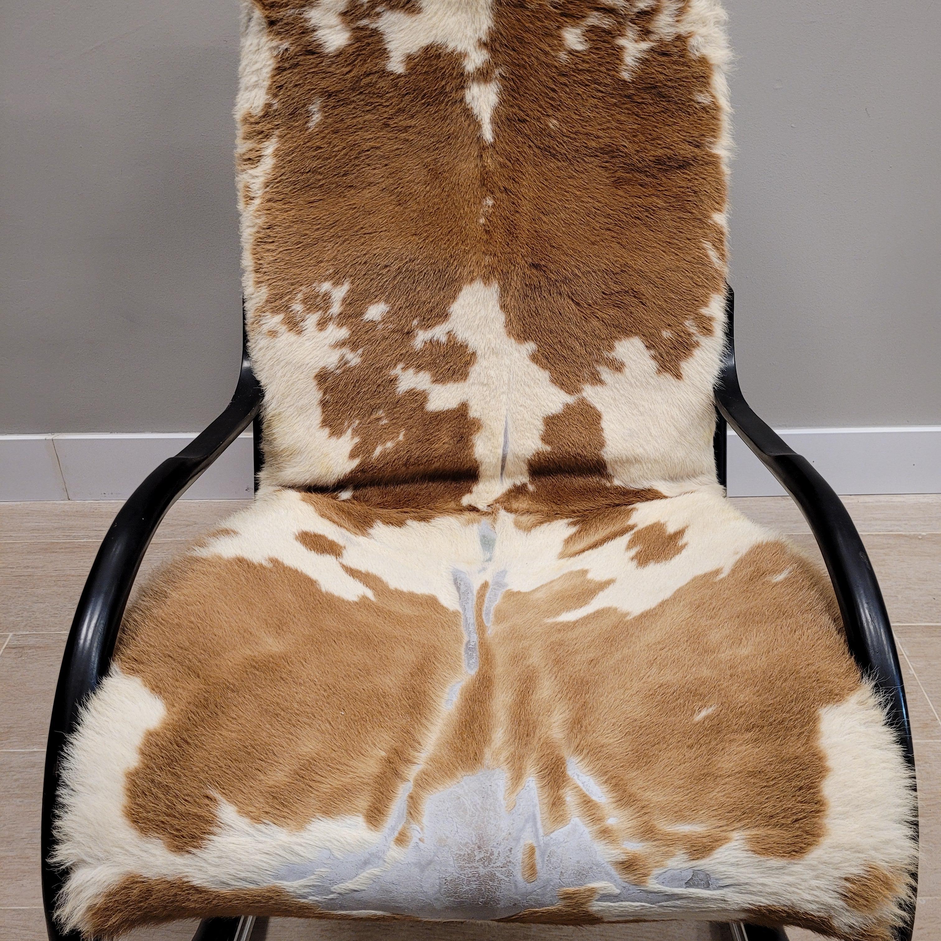 Late 20th Century Paul Tuttle Swiss  Rocking chair cowleather steel black wood For Sale