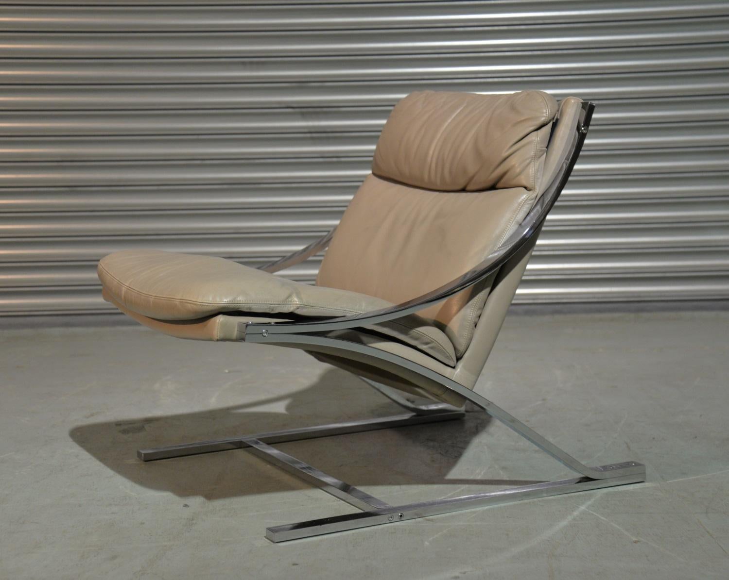 We are delighted to offer you an iconic  'Zeta' armchair by designer Paul Tuttle for Strassle International of Switzerland. The name 'Zeta' originated from the 'Z' shaped chrome base. Hand built to an incredibly high standard, with a chrome-plated