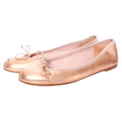 Paul Warmer, pink metallic ballerinas