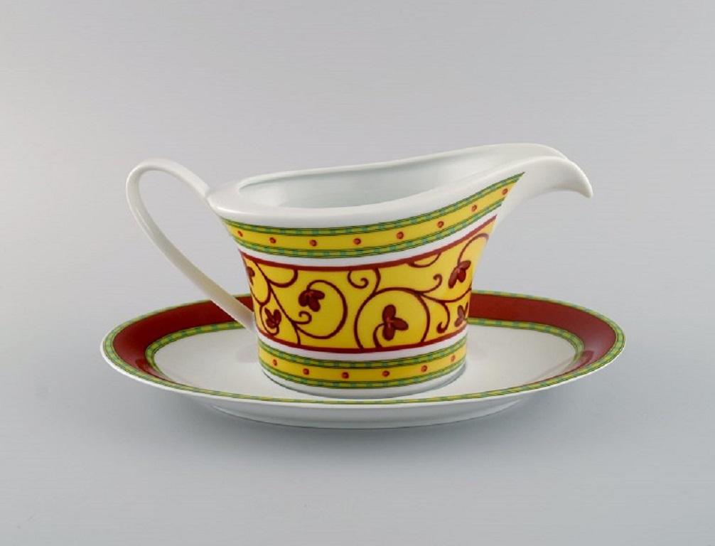 Paul Wunderlich for Rosenthal. 
Bokhara sauce boat with saucer in porcelain. Colorful design, late 20th century.
The sauce boat measures: 21 x 10.5 cm.
The saucer measures: 25.5 x 15.5 cm.
In excellent condition.
Stamped.