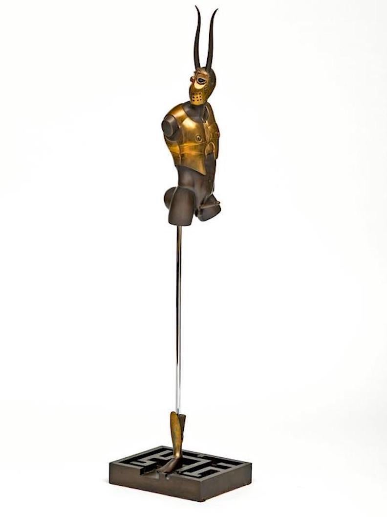 Bronze and brass sculpture by German artist Paul Wunderlich (1927-2010) of a Minotaur, complete with interchangeable large and small phallus. Great table or console sculpture as it stands over 30 inches tall. I first saw this incredible sculpture at