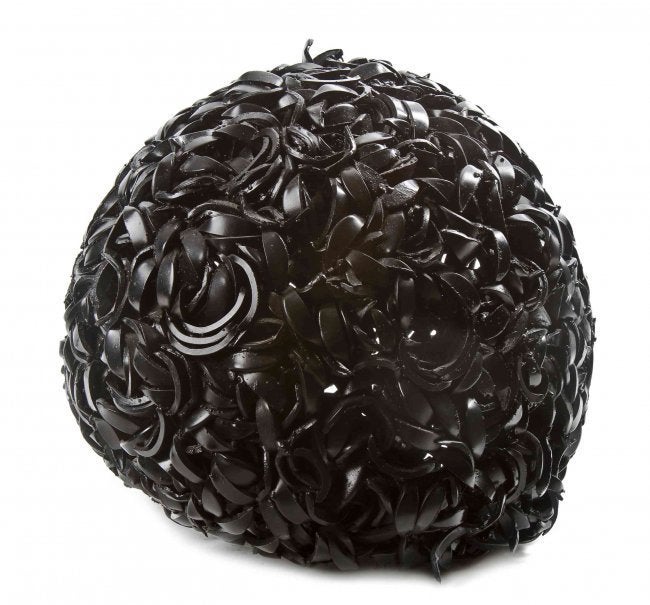 while composed of industrial steel this has a delicate almost floral quality to it and is suitable for the outdoors and would work beautifully in a garden. it also filters light through it. Paula Castillo recently completed large sculpture