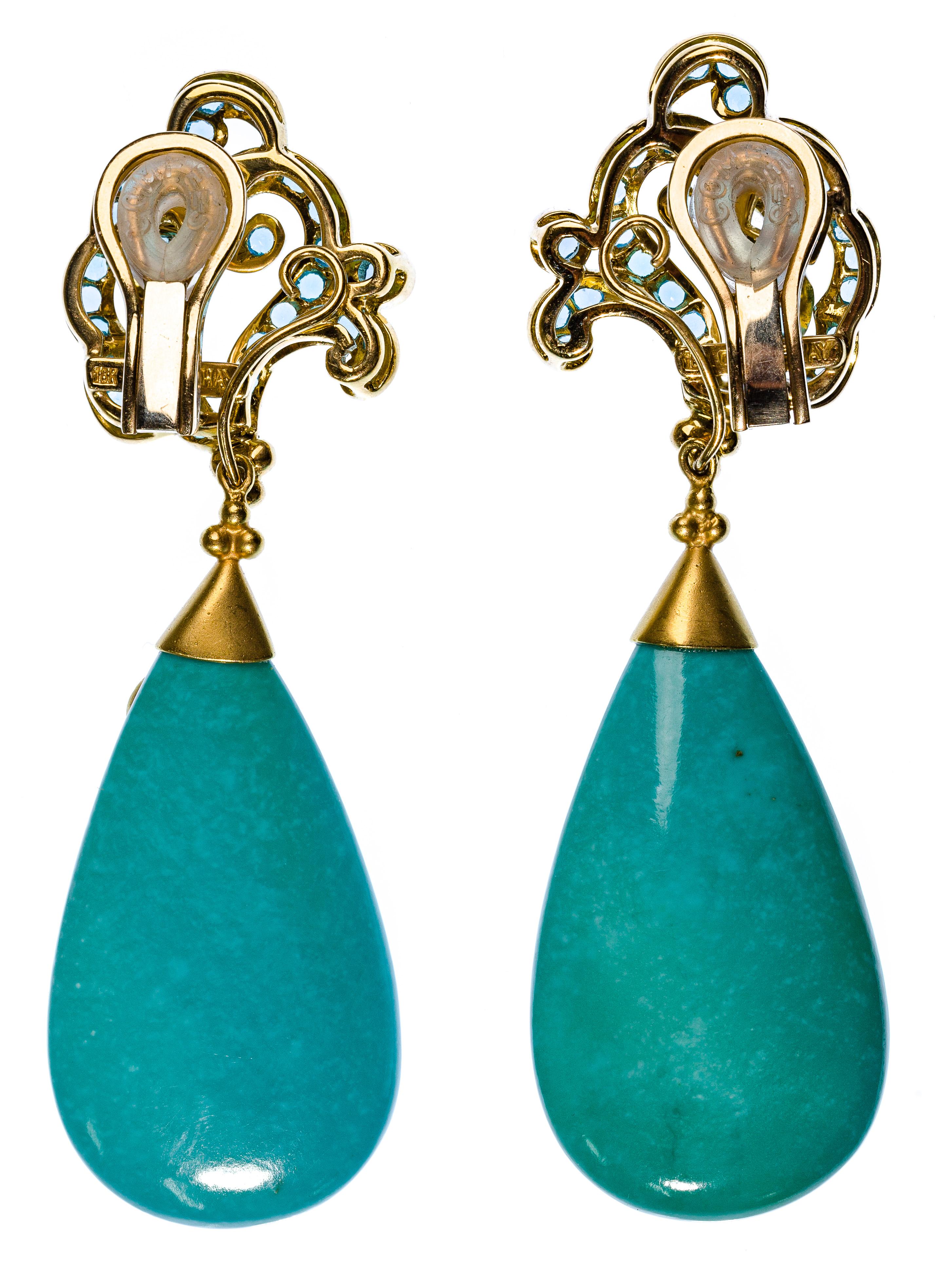Paula Crevoshay 18k Yellow Gold and Gemstone Clip-on Earring Set. This lovely set of drop style earrings has a blue gemstone top and turquoise tear shaped bottom, stamp signed and marked '18k'.

Dimensions
Length: 3 inches, Width: 7/8 inches
Weight: