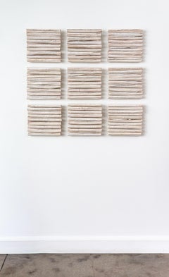 Au-delà des mots - sculpture murale de rouleaux de porcelaine