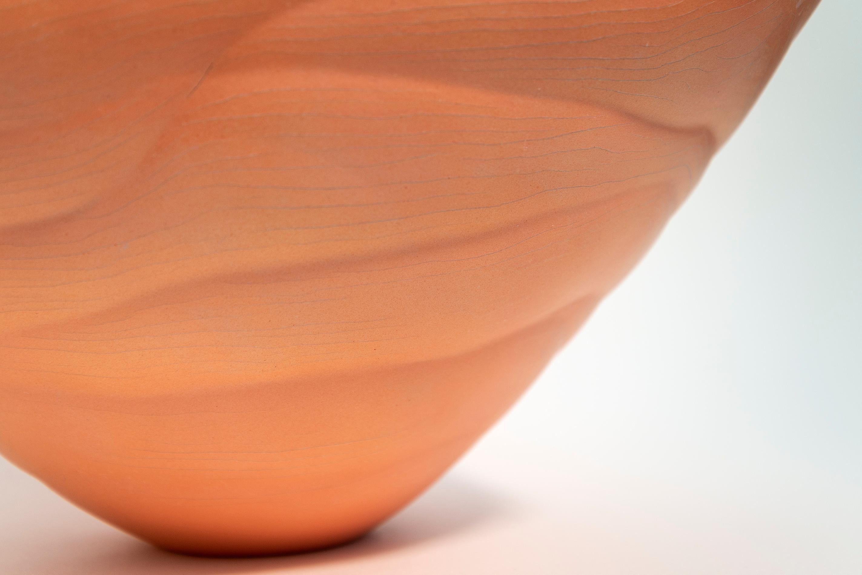 Artist Paula Murray’s work is rooted in her spiritual journey and expressed in the uniquely beautiful ceramics she creates. Sacred Dance is a series of porcelain vessels—the undulating curves of each formed using her own clay recipe.
This elegant