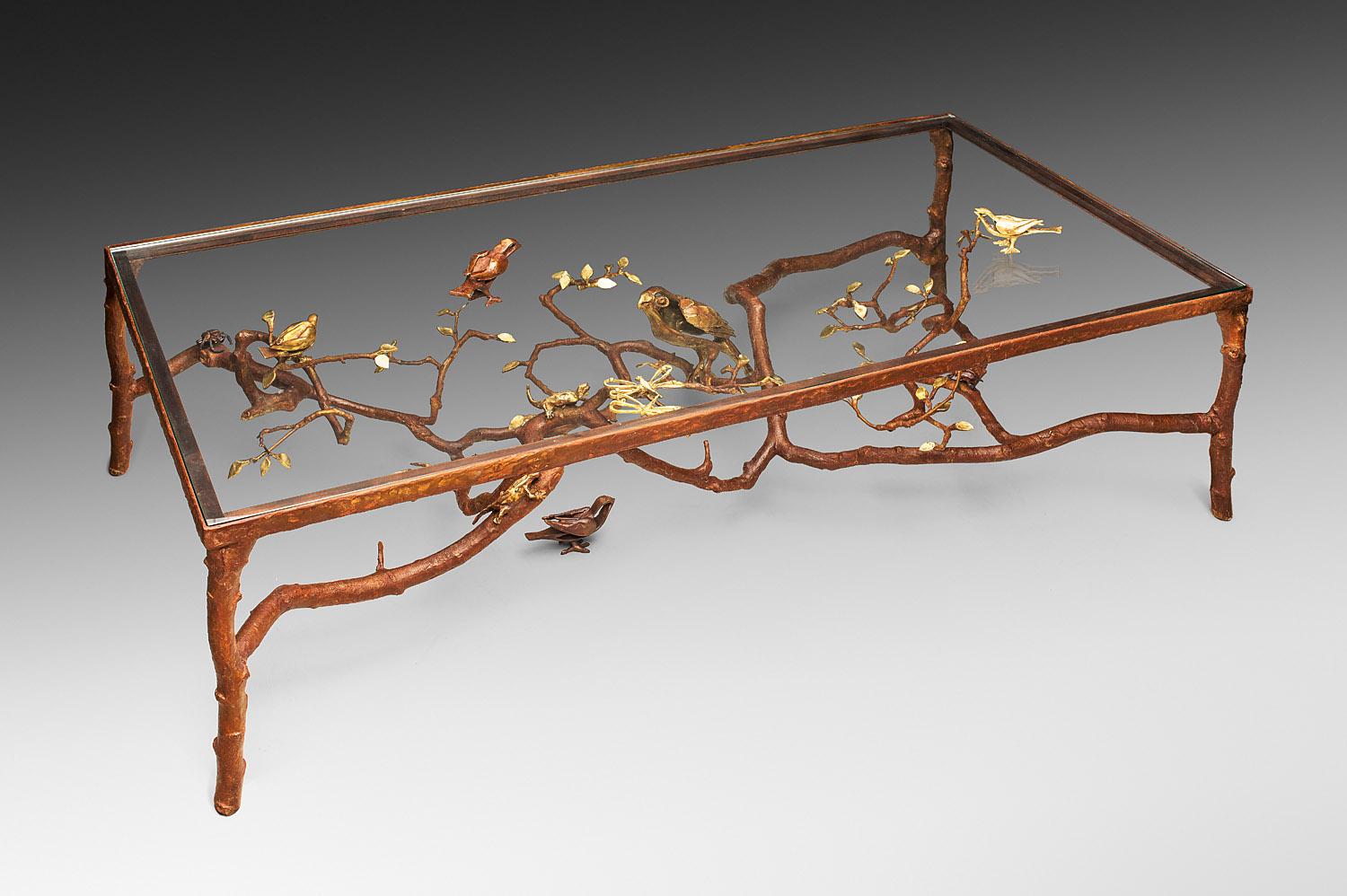 Paula Swinnen 2012, Unique table with parrot , bronze , patina gold and brown,
 177 x 86 cm, height 47 cm, 
One parrot, one bird, two lizards, two beetles, two dragonflies
Unique piece.
Signed.
Exhibited in 2012
Mai 
