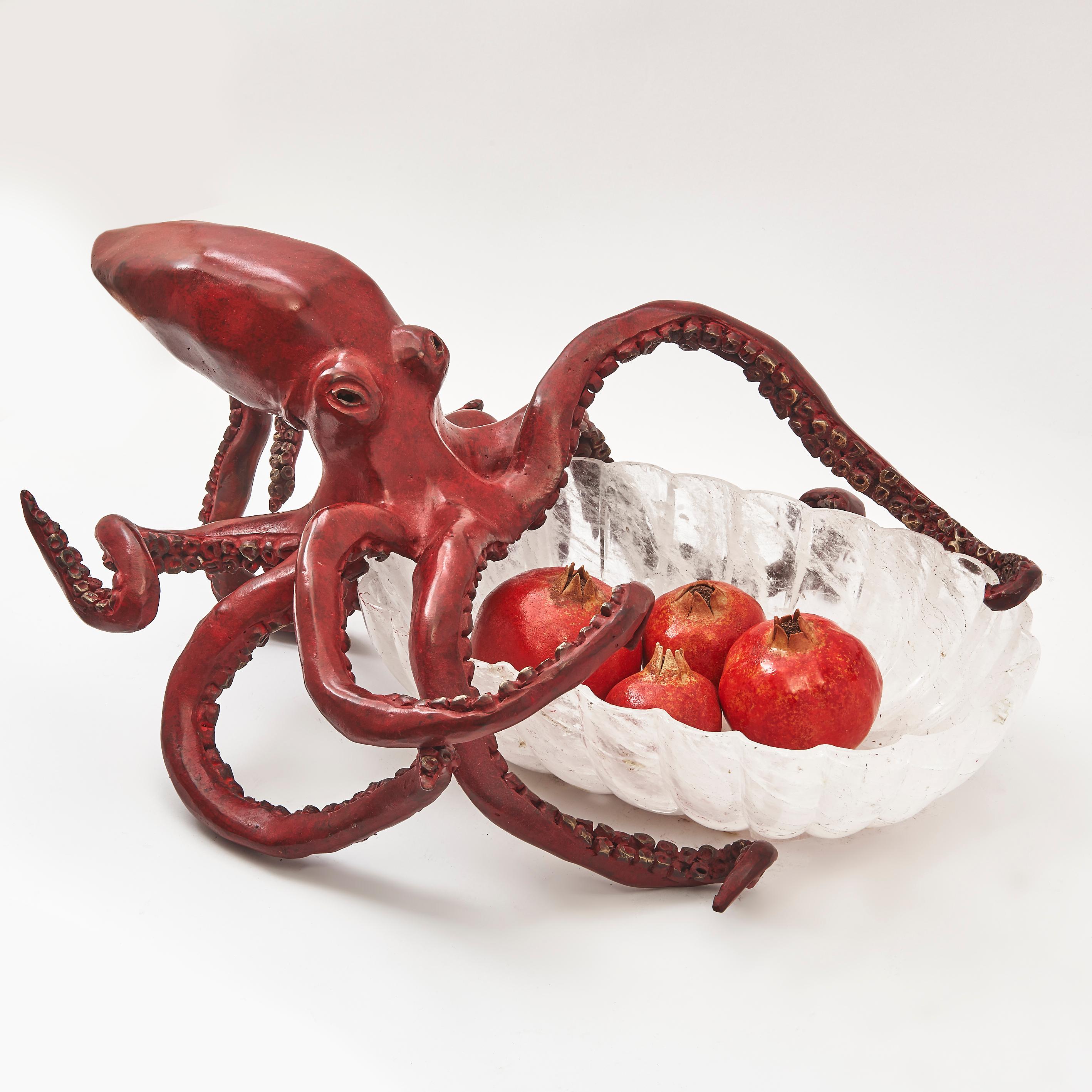 An impressive centre piece featuring a Bronze octopus with red colouring and polished bronze suckers, tentacles encircling a contemporary rock crystal bowl. Signed and dated the Belgian artist Paula Swinnen, 2019.
Non-export (UK) sales are subject