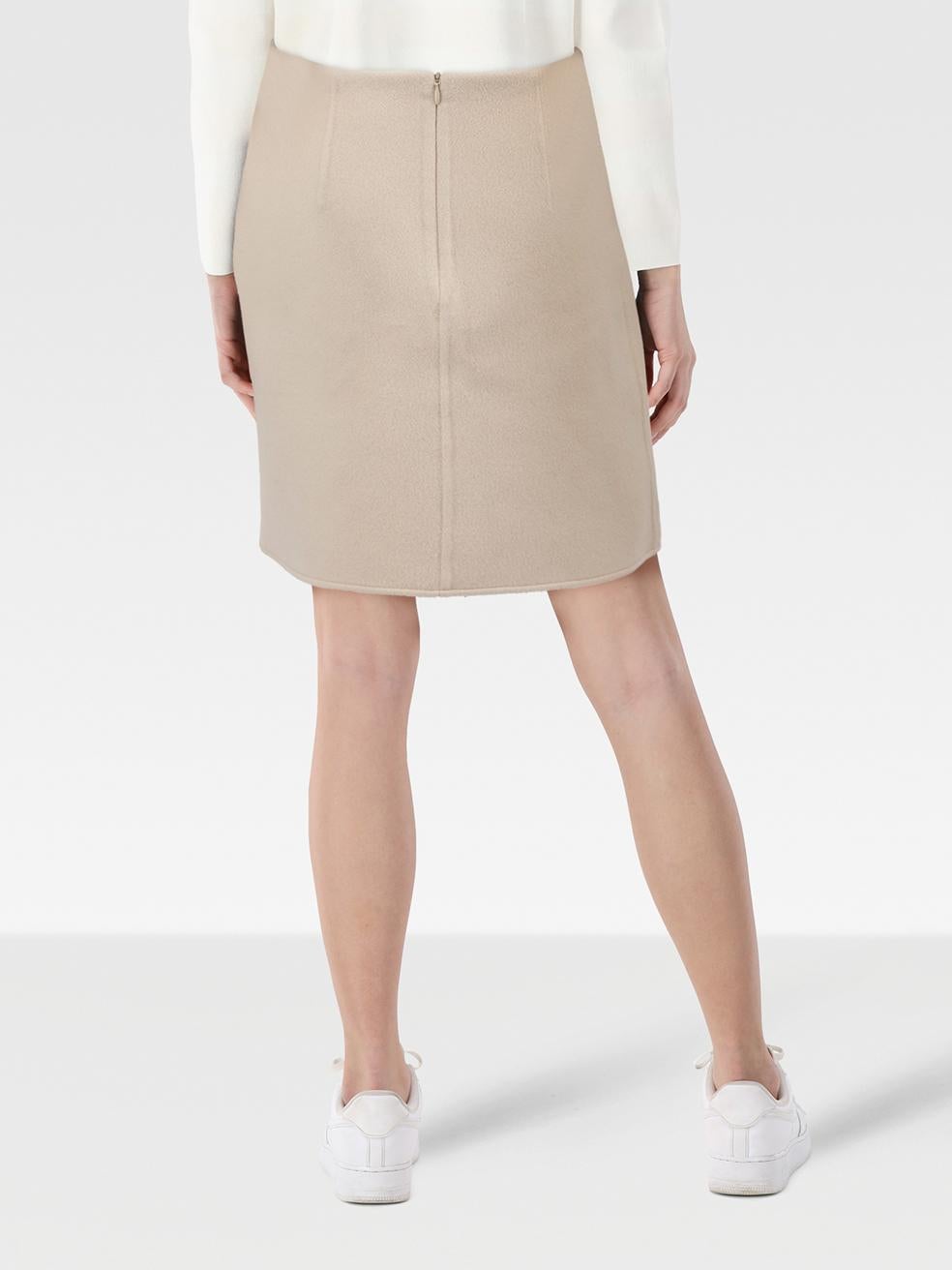 CONDITION is Very good. Minimal wear to the skirt is evident. Marks on the lower front of this used Paule Ka designer resale item. Marks may need gentle hand wash contrary to dry clean instructions.
 
 
 
 
 Details
 
 
 Beige
 
 Wool
 
 Skirt
 

