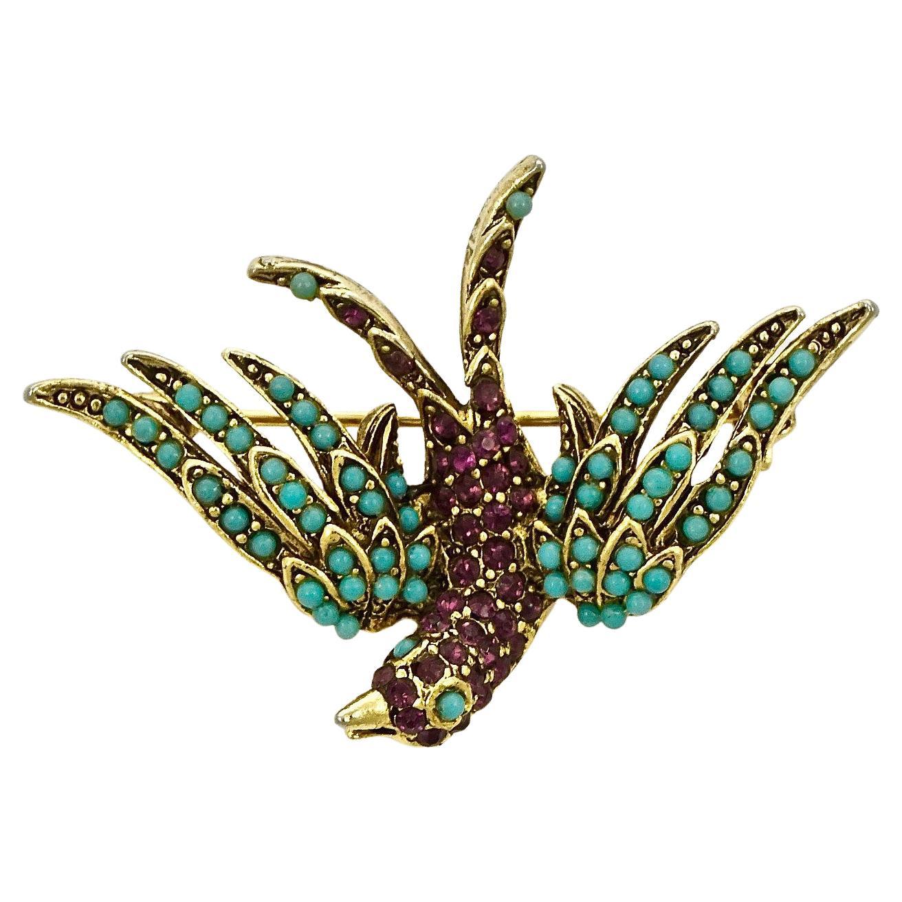 Pauline Rader Gold Plated Amethyst Rhinestone and Turquoise Glass Bird Brooch For Sale