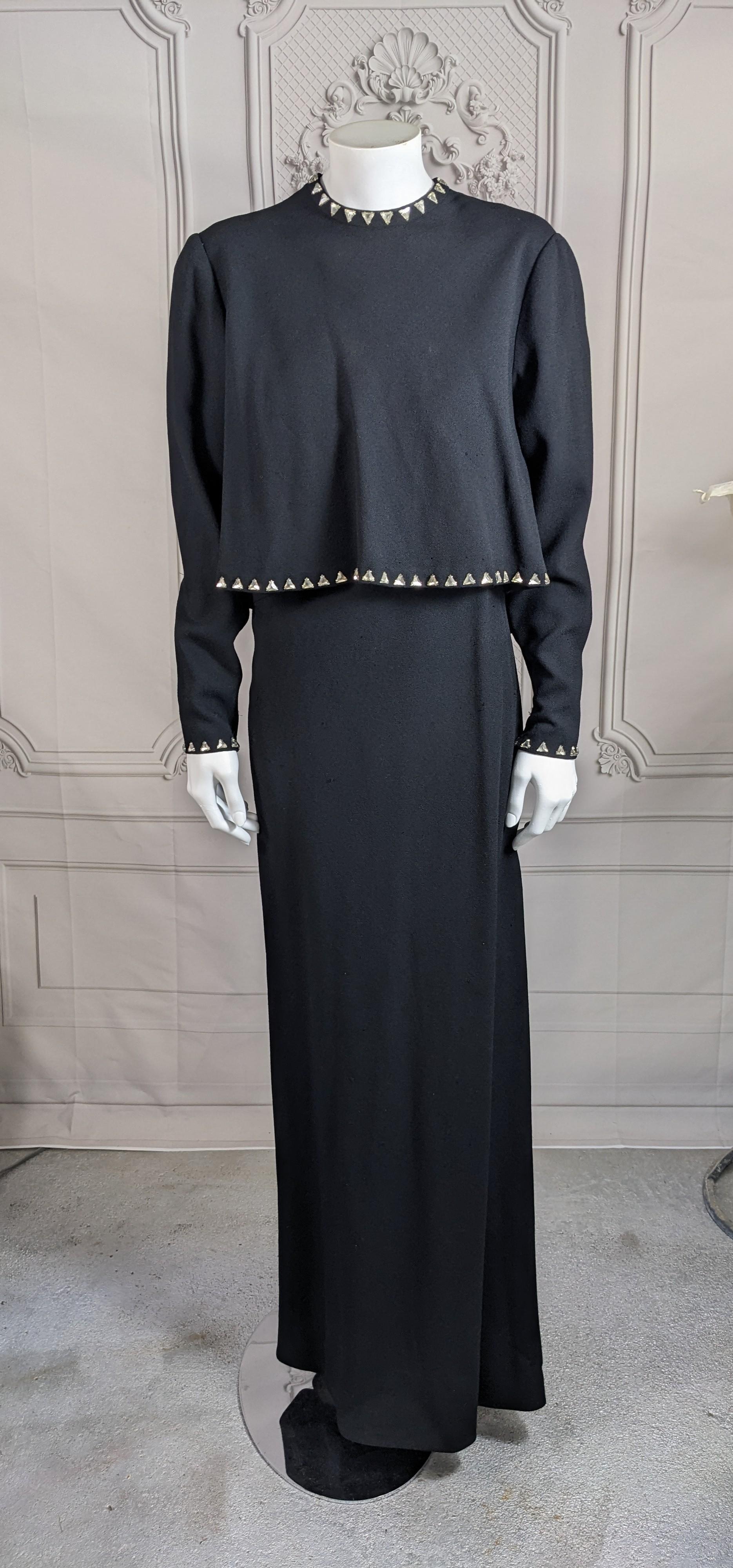 Elegant Pauline Trigere Crystal Wool Crepe Crystal Gown. 2 piece ensemble with hand set triangular crystal stone embellishment. Simple black crepe gown with side zip paired with separate over blouse studded with crystals.  Blouse is bias cut with