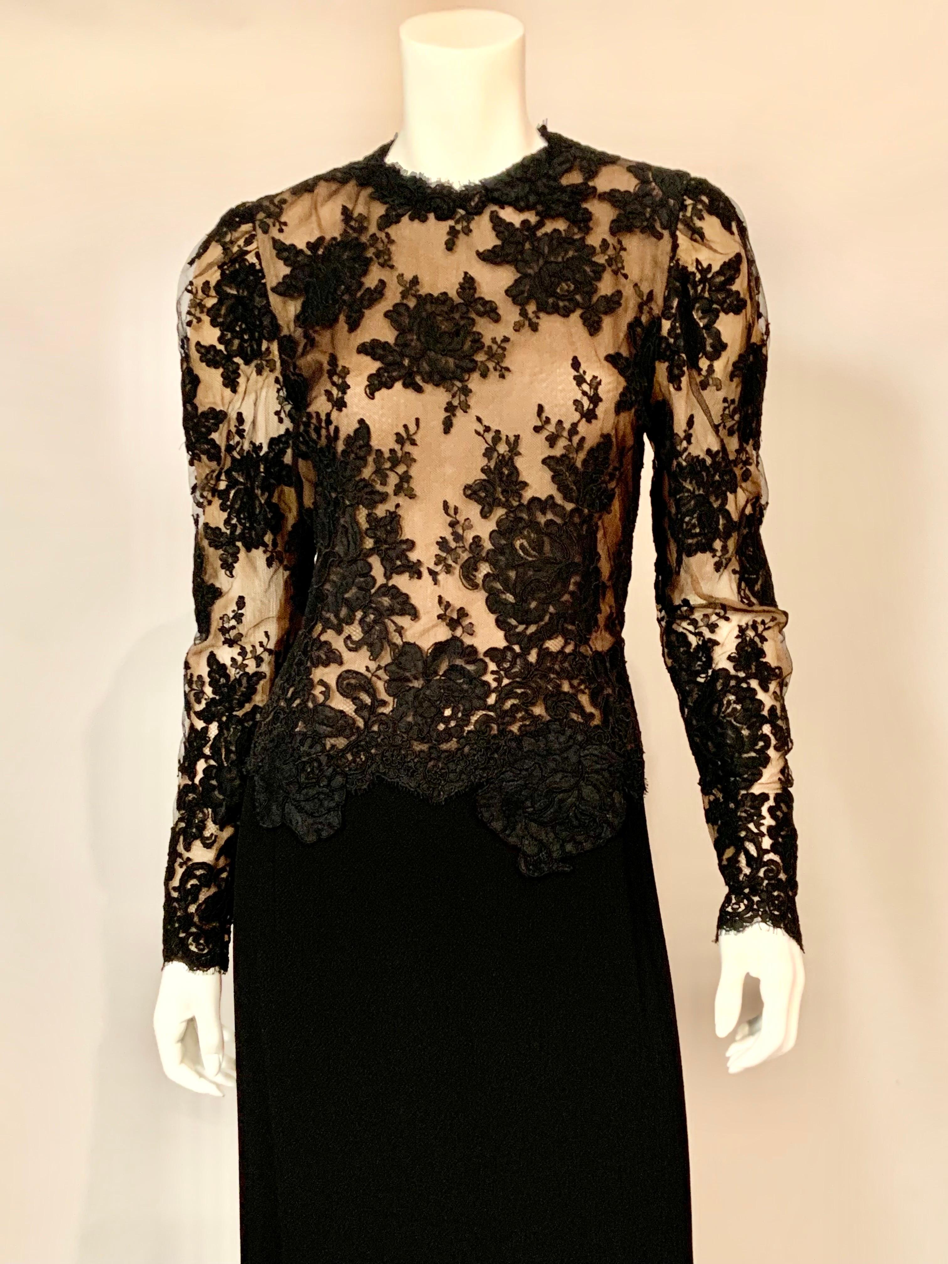 This is a classically elegant evening dress from Pauline Trigere. The bodice is black lace over nude silk chiffon. Appliques of floral black lace are placed partially on the lace top and the black crepe skirt, softening the transition between the
