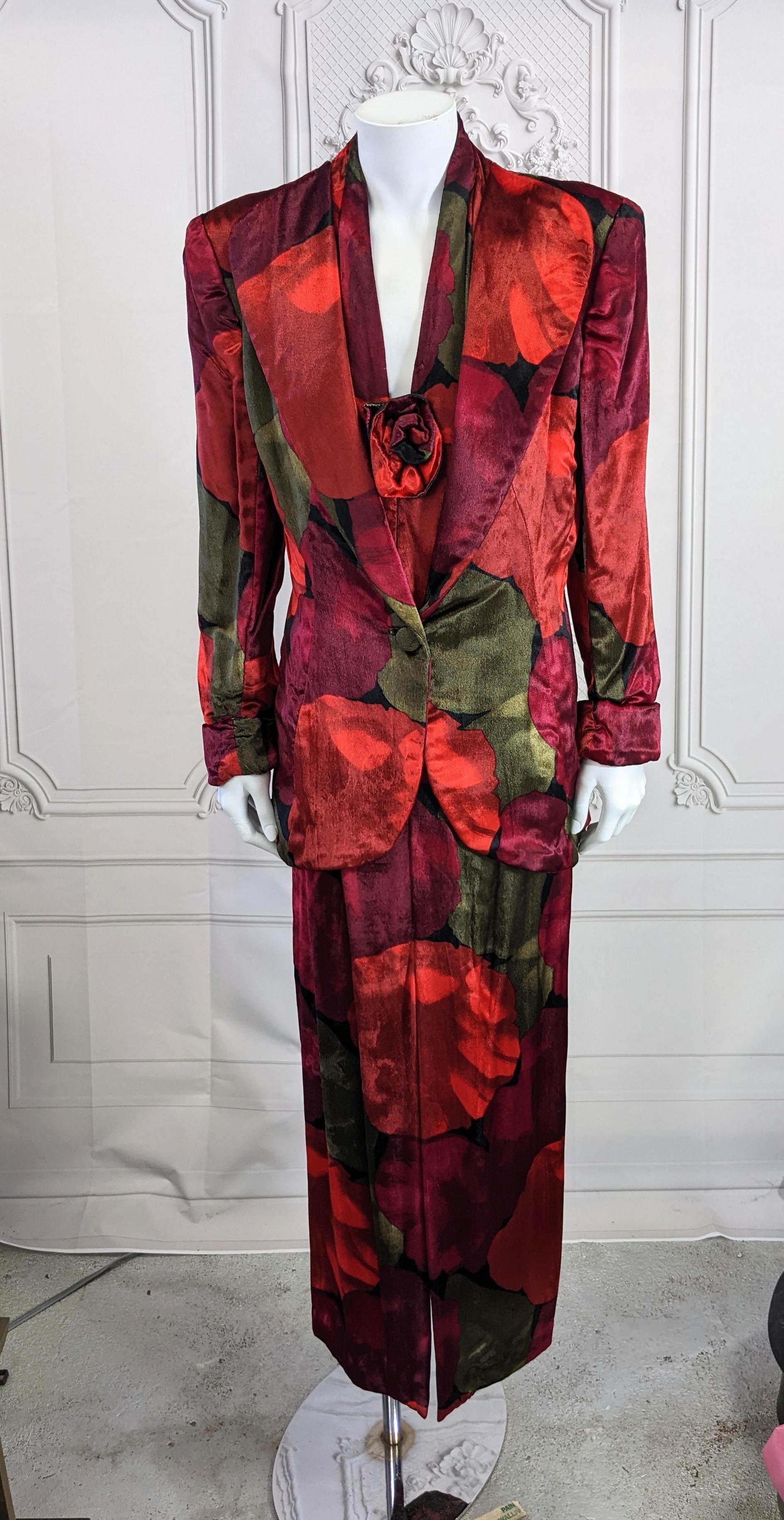 Chic Pauline Trigere Silk Velvet Evening Suit comprised of a sharply tailored blazer and halter gown. 2 great pieces which can be used as separates. 
Great blazer with wide lapels which buttons low with a single button. Halter dress has draped