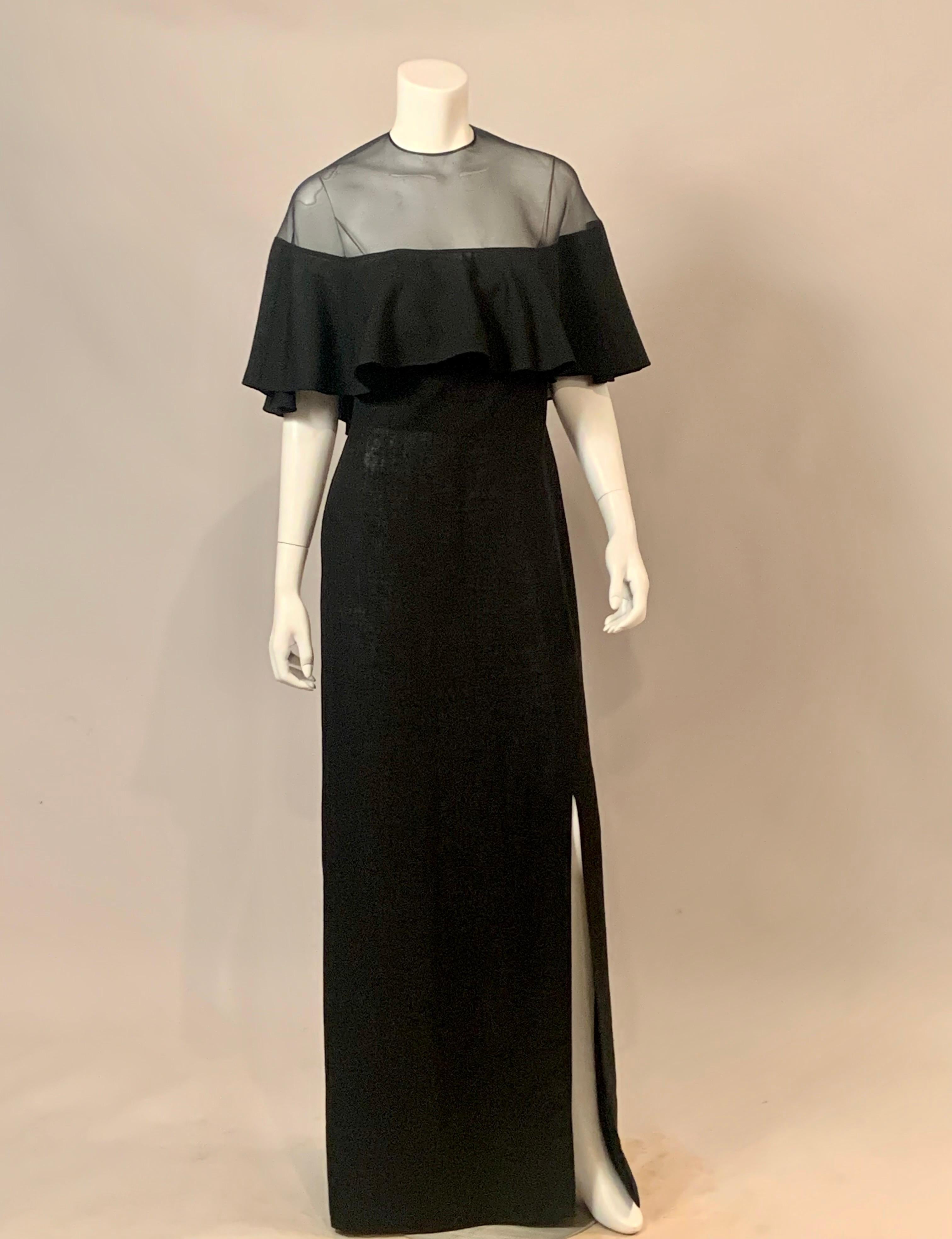 Pauline Trigere designed this two piece evening dress in the 1970's for Bergdorf Goodman. It has a short capelet top with sheer black silk organza at the neckline, which closes at the center back with a black silk tie.  The bottom of the capelet is