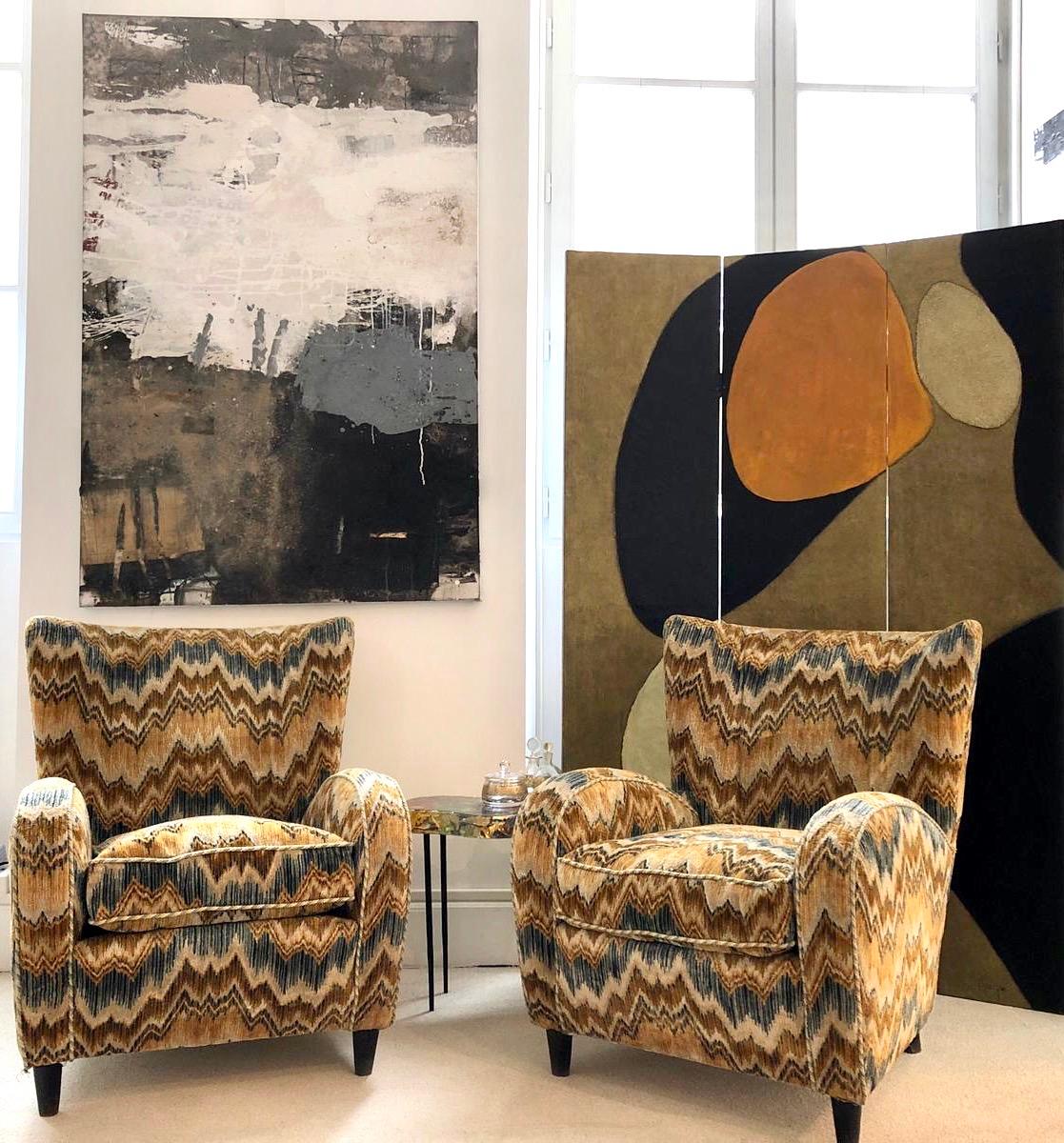 Stunning armchairs set by Paolo Buffa made in Italy, 1950s. Padded wood with original Missoni multicolored fabric. Good vintage conditions to the original upholstery as seen.
This pair of armchairs will perfectly match any style, the color gold,