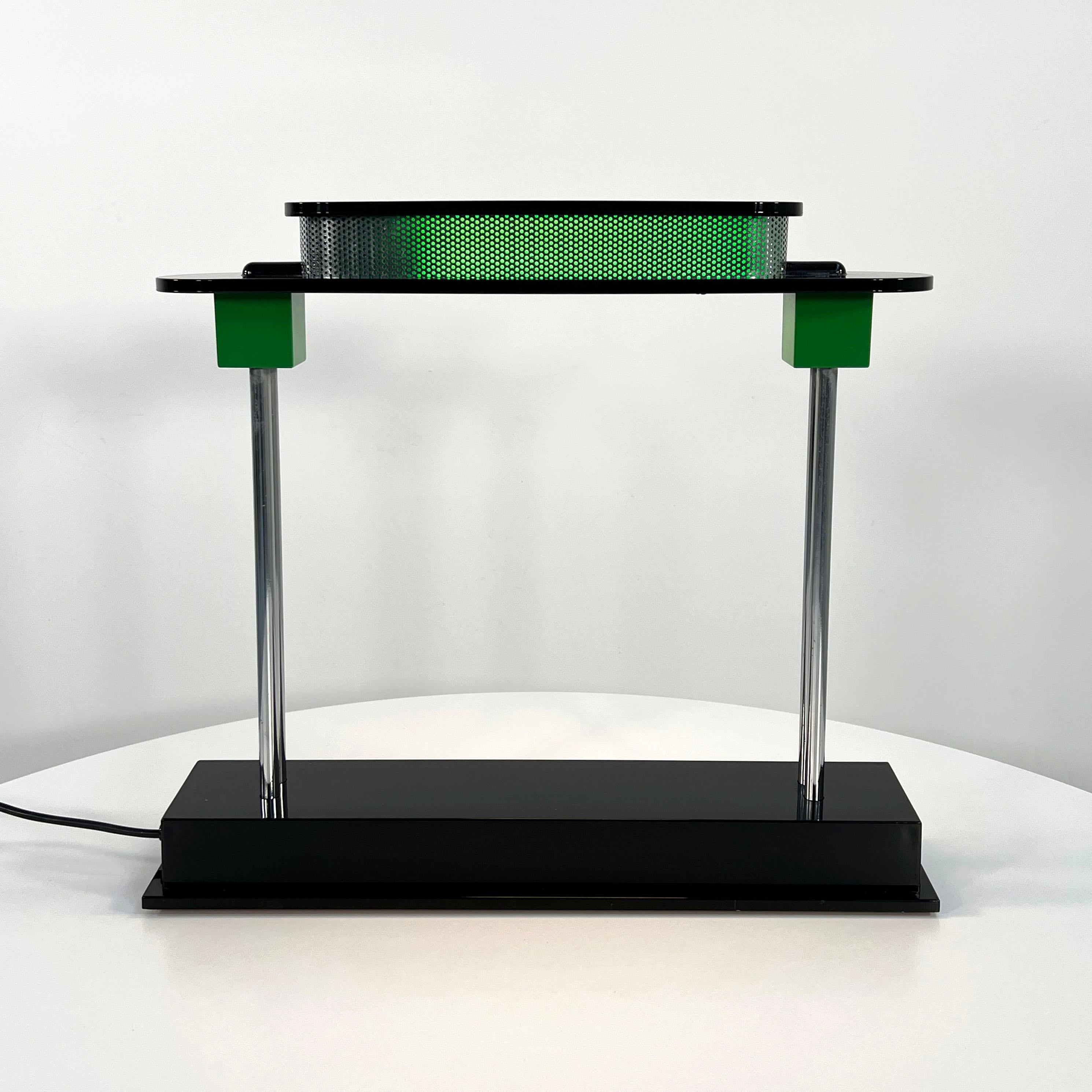 Pausania Table Lamp by Ettore Sottsass for Artemide, 1980s
Designer - Ettore Sottsass
Producer - Artemide
Model - Pausania Table Lamp
Design Period - Eighties
Measurements - Width 48 cm x Depth 11 cm x Height 43 cm
Materials - Metal, Plastic
Color -