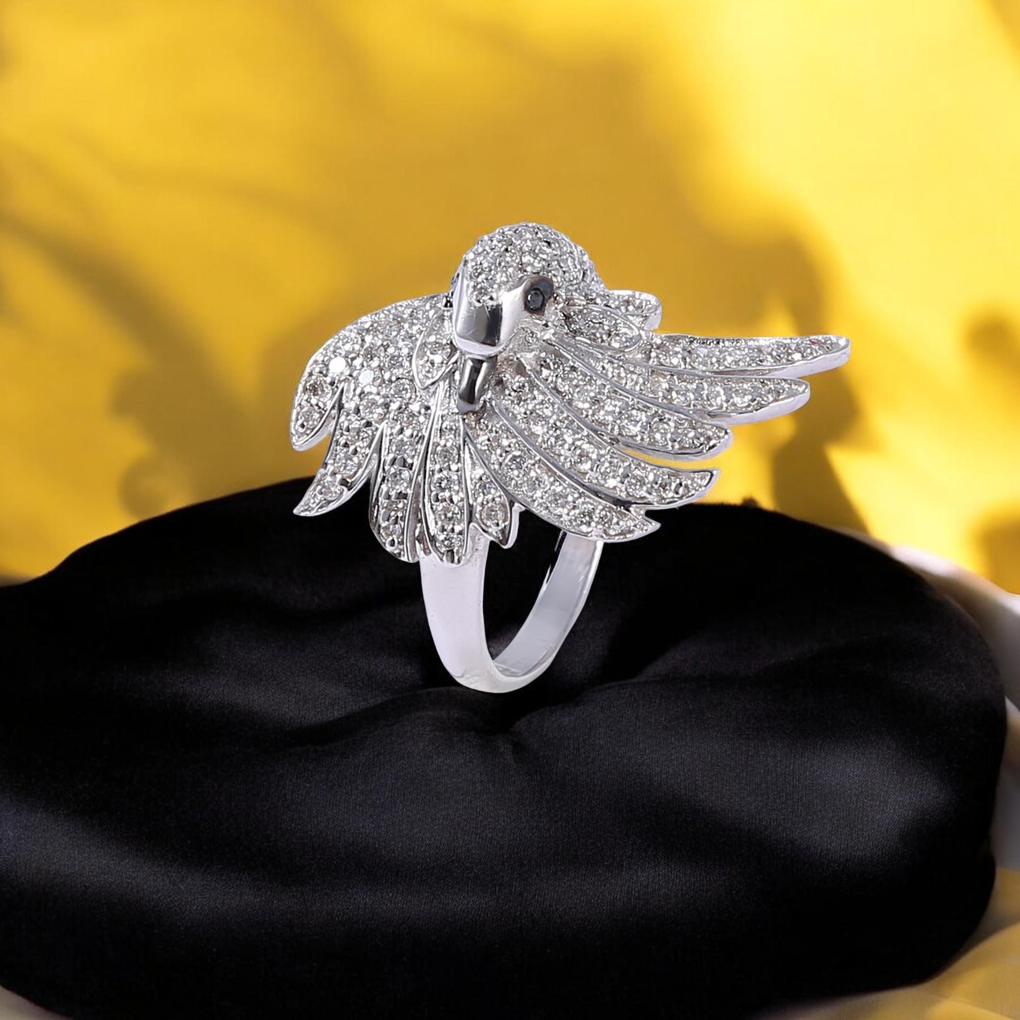 Pave 1.42 Cts F/VS1 Round Brilliant Cut Natural Diamonds Peacock Ring in 18K Gold is a stunning engagement ring for women who appreciate beauty and elegance. This customised ring features a white diamond with excellent cut grade and very slightly