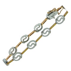 Bracelet tennis en diamants jaunes et blancs pavés de 2,50 carats
18 carats or 18 carats