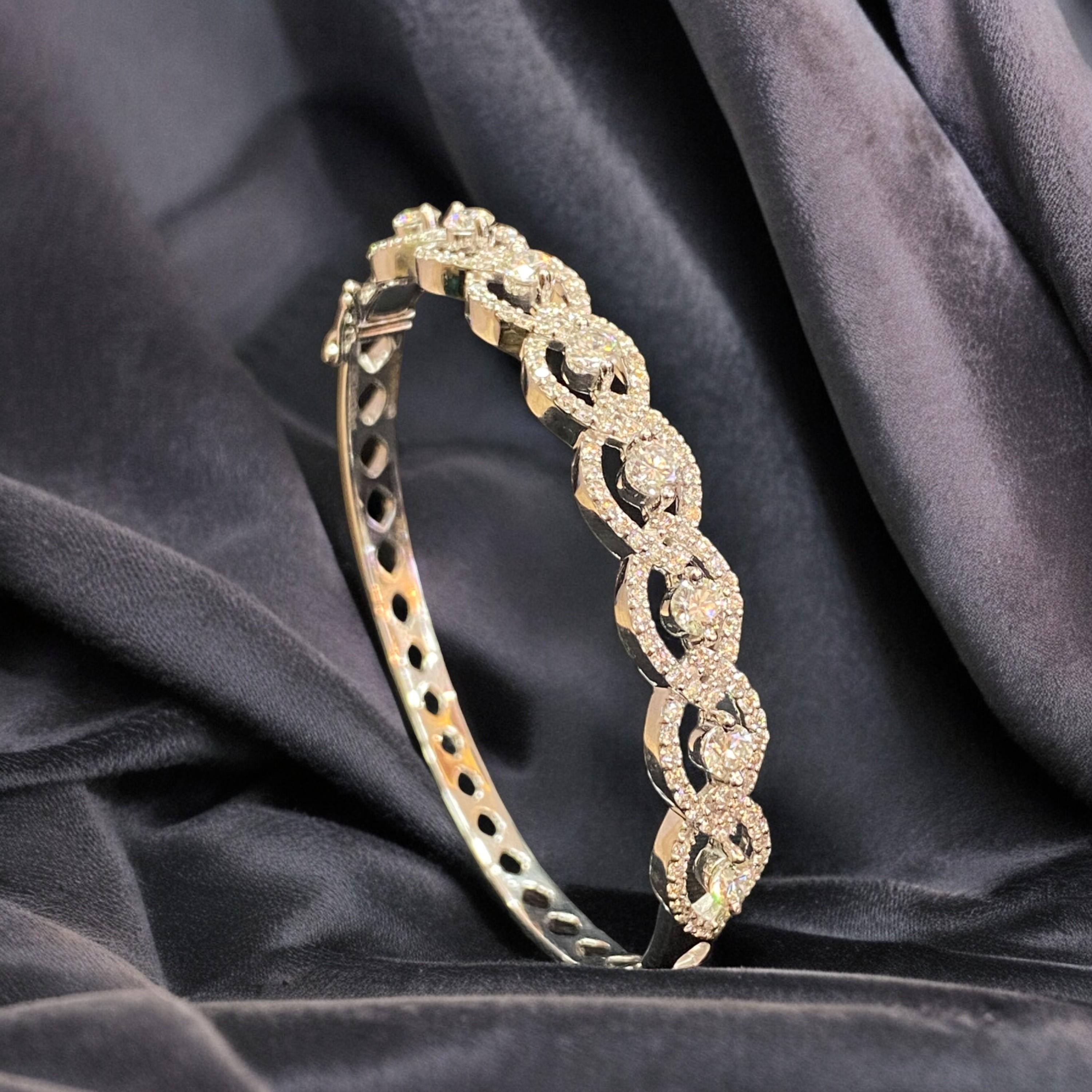 This exquisite bracelet is sure to bring a million-dollar smile. Crafted with 2.70 carats of round brilliant natural diamonds in 14K white gold, this stunning piece promises to make you feel truly regal!

Specifications : 

Diamond Weight : 2.70 Cts