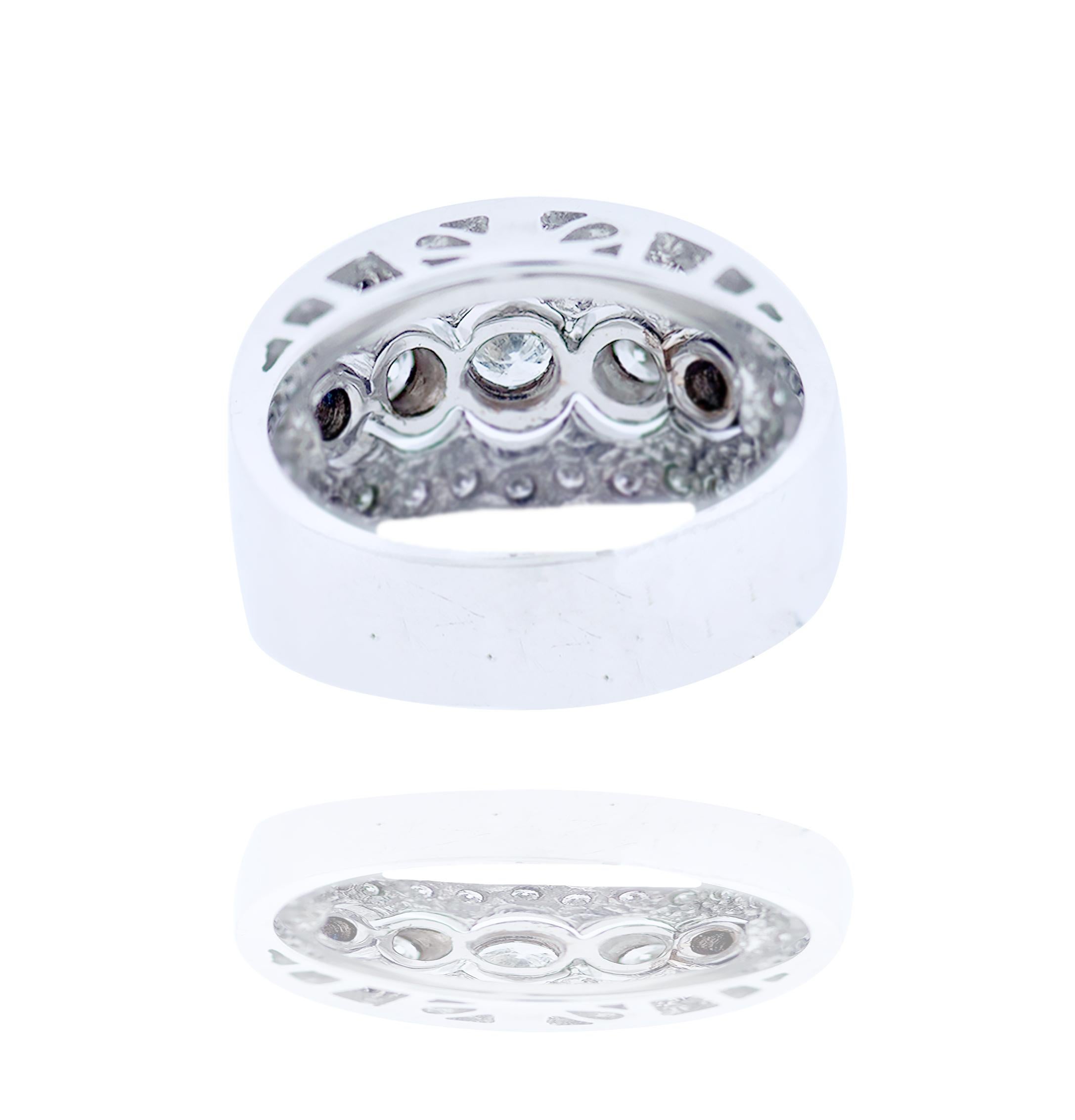 PAVE, 5- Stone Bezel Diamond, 11.50 mm Band Ring
Graduated diamonds encompassed a total weight f .96 carat. Quality are Si1 clarity and H color. Weight is 8.4 grams. Ring size is 6.75 
GIA Gemologist Appraised and Evaluated