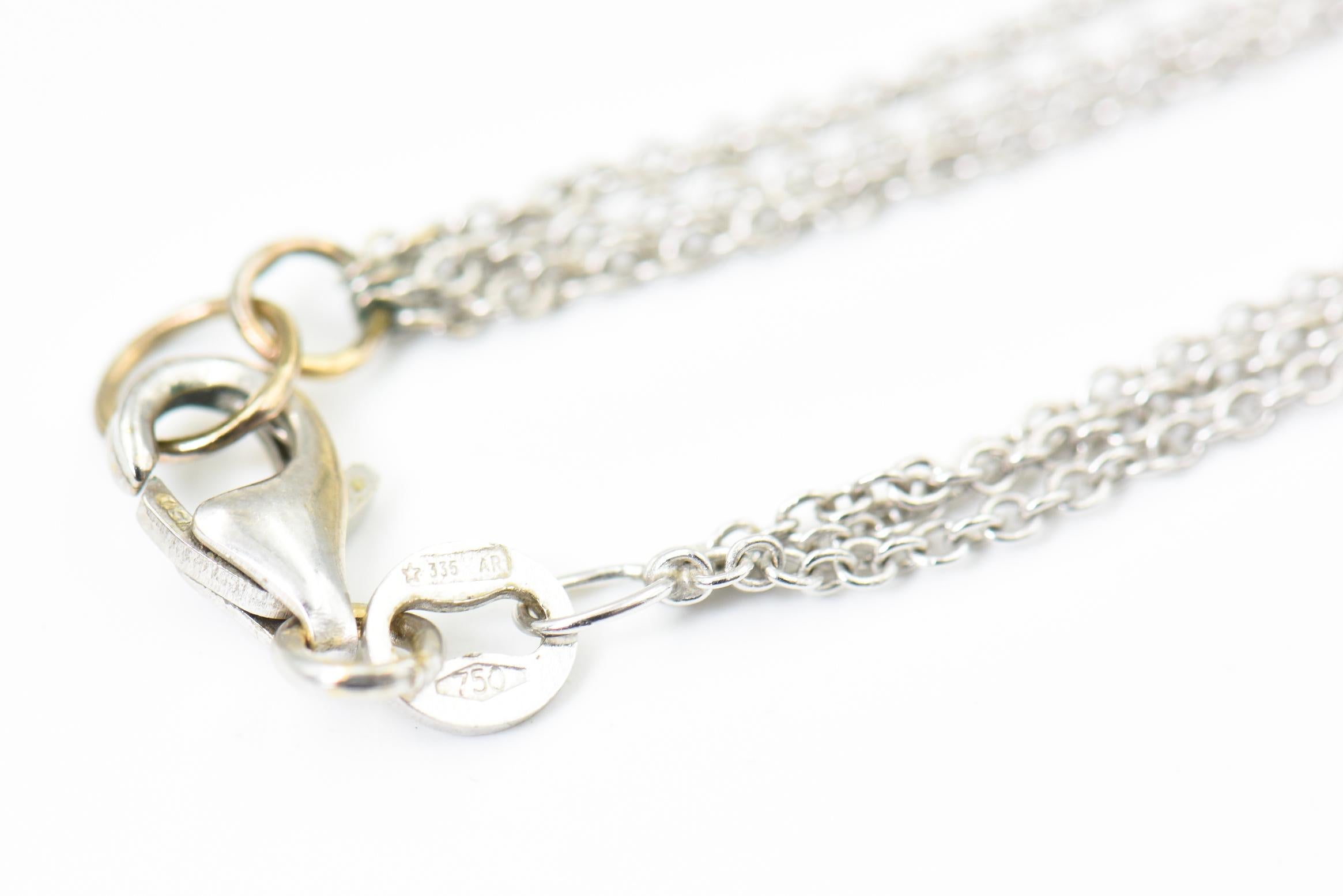 Collana con ciondolo in oro bianco con diamanti bianchi e neri fluttuanti in vendita 2