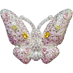 Spilla Pavé a forma di farfalla con cristalli rosa, gialli e trasparenti in montatura d
argento
