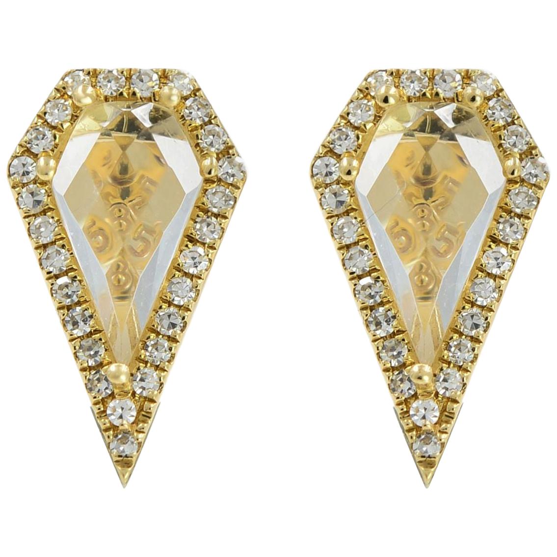 Brand new trendy jewelry with real gold and real diamonds. Beautiful stud earrings crafted in 14K yellow gold, feature a kite shaped center white topaz weighing 1.20cts with diamond accented halo weighing 0.12ct. Earring measurement: Height: 11.6mm;