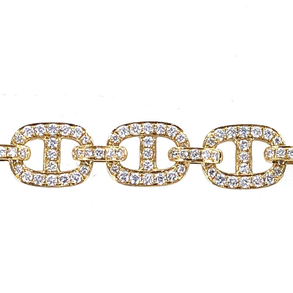 Stylish anchor link diamond bracelet fashioned in 18 karat yellow gold. The links are pave set with 3.65 carat total weight of diamonds graded G-H color and SI clarity. The bracelet measures 7.25 inches in length and 8mm in width.