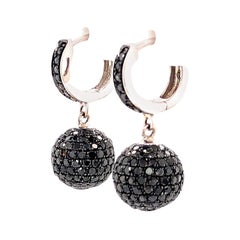 Ballohrringe aus 18 Karat Gold mit Diamanten in Pflaster