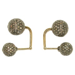 Boucles d'oreilles Tunnel en or avec boules de diamants pavés