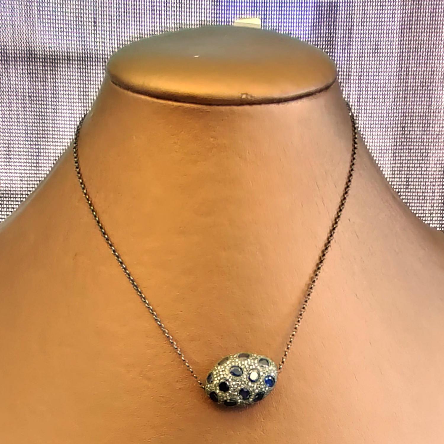 Mixed Cut Pave Diamond & Blue Sapphire Nugget Shaped Pendant Necklace in Silver For Sale