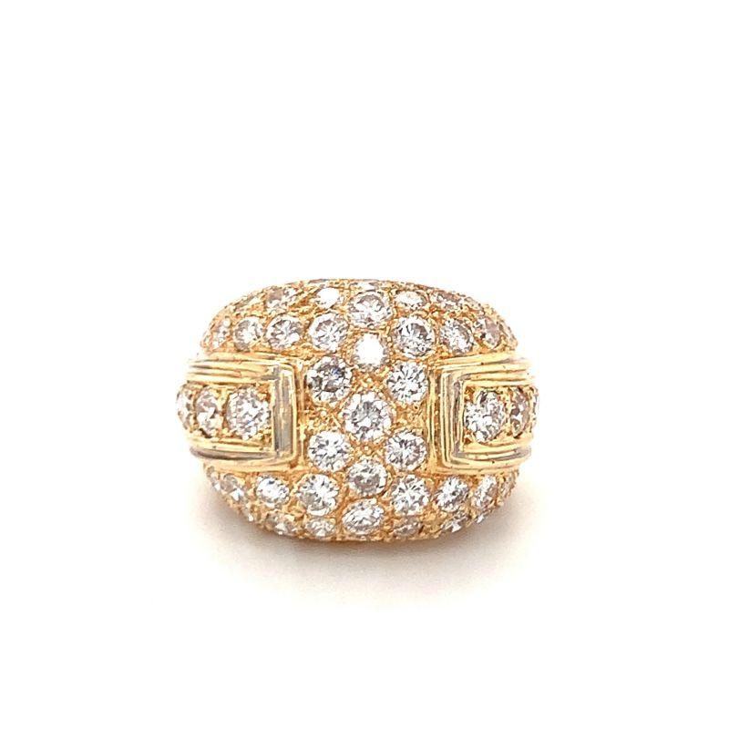 One pave diamond bombe 14K yellow gold ring featuring 71 old European and round brilliant cut diamonds weighing approximately 5.50 ct. Circa 1970s.

Shimmering, gleaming, bold.

Additional information:
Metal: 14K yellow gold
Gemstone: Diamonds